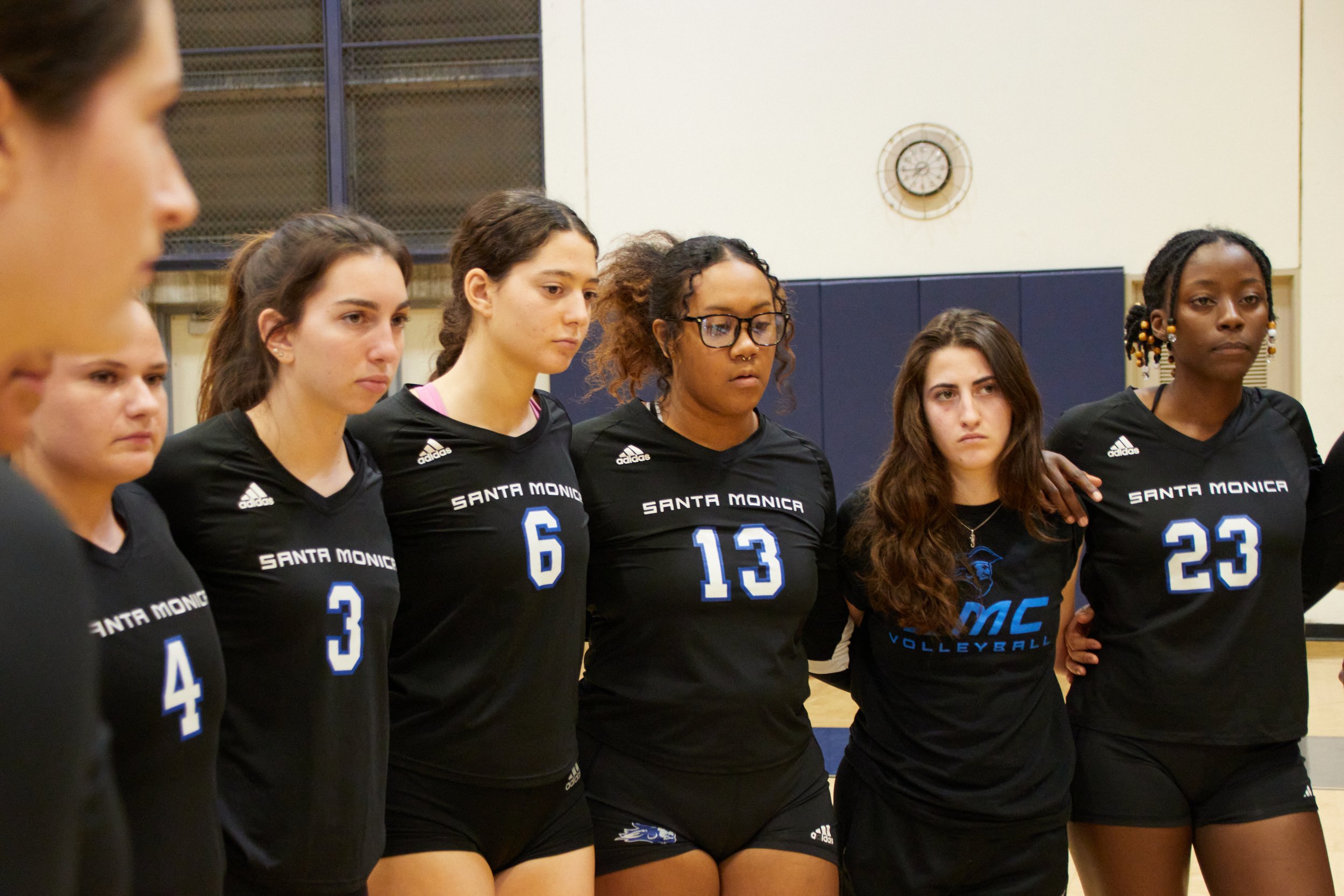  Santa Monica College Corsairs women's volleyball member during a timeout at the match against Cypress College Chargers at Cypress College Gymnasium number 2, Cypress, Calif., on Nov 21, 2023. The Chargers have started catching up in points, putting 