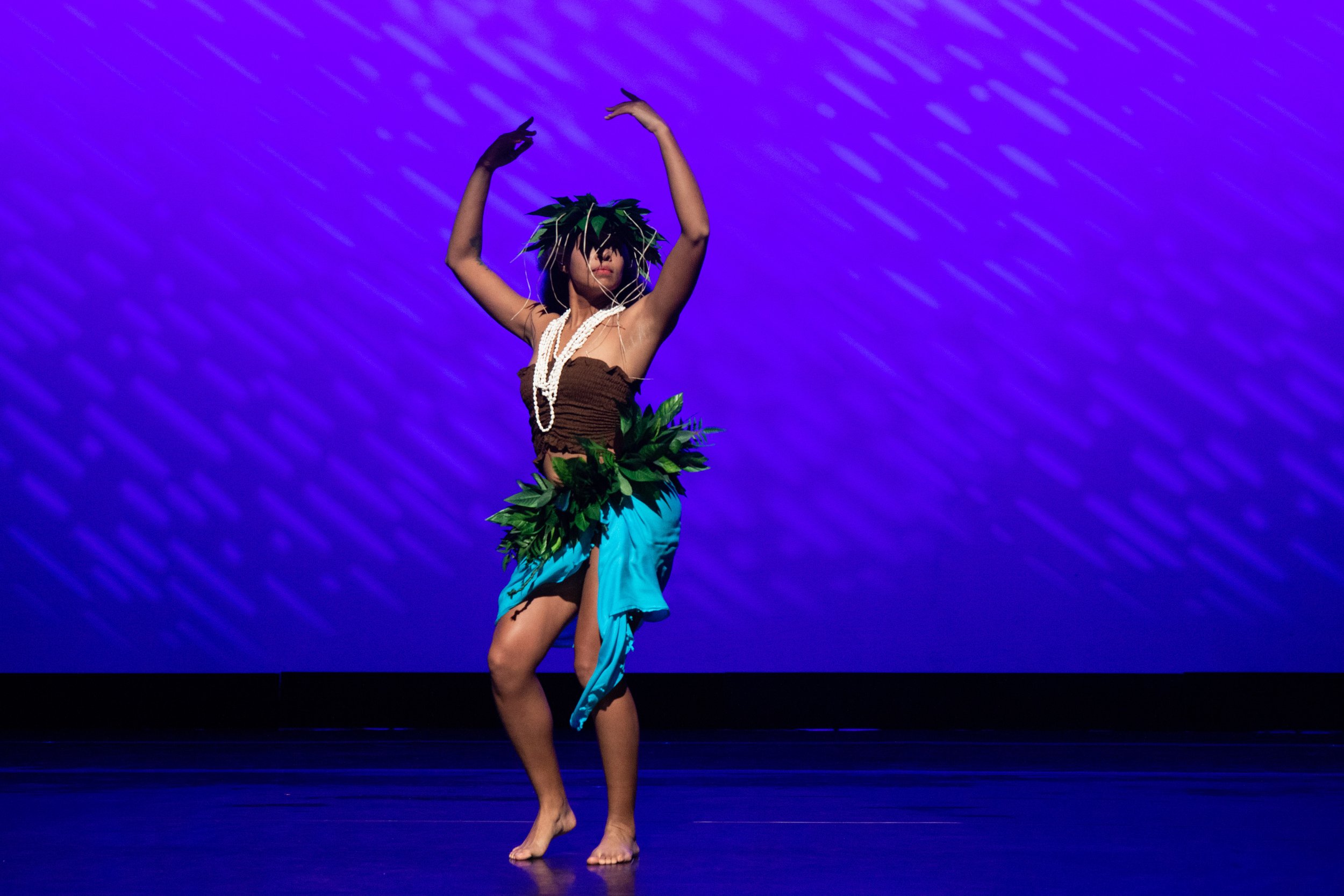  Santa Monica College students perform "Hōkūleʻa", a  Hawaiian/Tahitian choreography at the dress rehearsal for Global Motion on stage at BroadStage in Santa Monica, Calif. on Wednesday, Nov. 15, 2023. (Akemi Rico | The Corsair) 