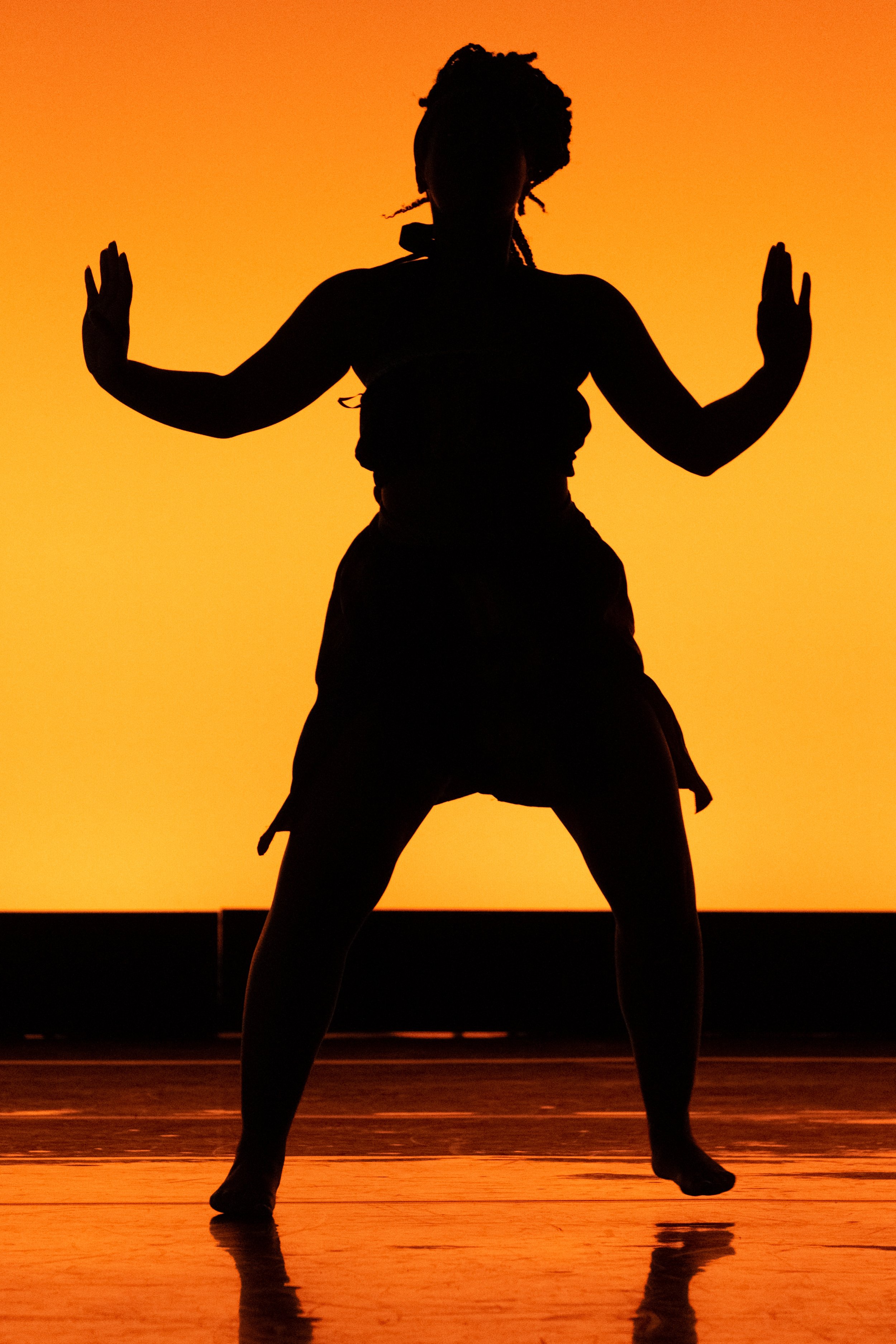  Santa Monica College student Jada Richmond performs "Heredon", a West African Mandé at the dress rehearsal for Global Motion on stage at BroadStage in Santa Monica, Calif. on Wednesday, Nov. 15, 2023. (Akemi Rico | The Corsair) 
