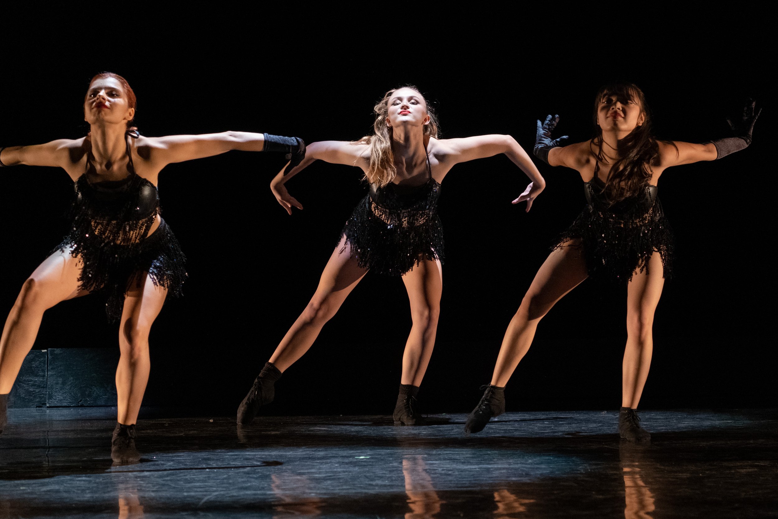  Santa Monica College students (L to R) Angelina Roychenko, Zoe Miller and Heather Ongpauco perform "Ladies First", a Jazz Funk choreography at the dress rehearsal for Global Motion on stage at BroadStage in Santa Monica, Calif. on Wednesday, Nov. 15