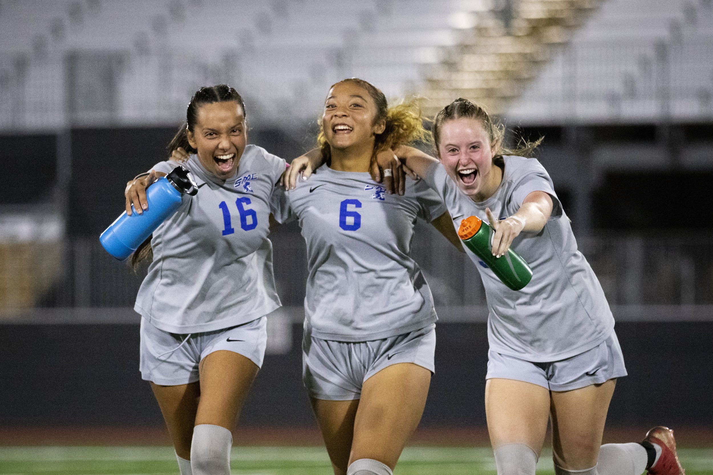  Santa Monica College Corsairs defense Bella Velazco (L-R), forward Tia Lucas, and defense Izzy Turner run back from the locker room at the end of halftime during a soccer game against the Saddleback College Bobcats at Saddleback College in Mission V