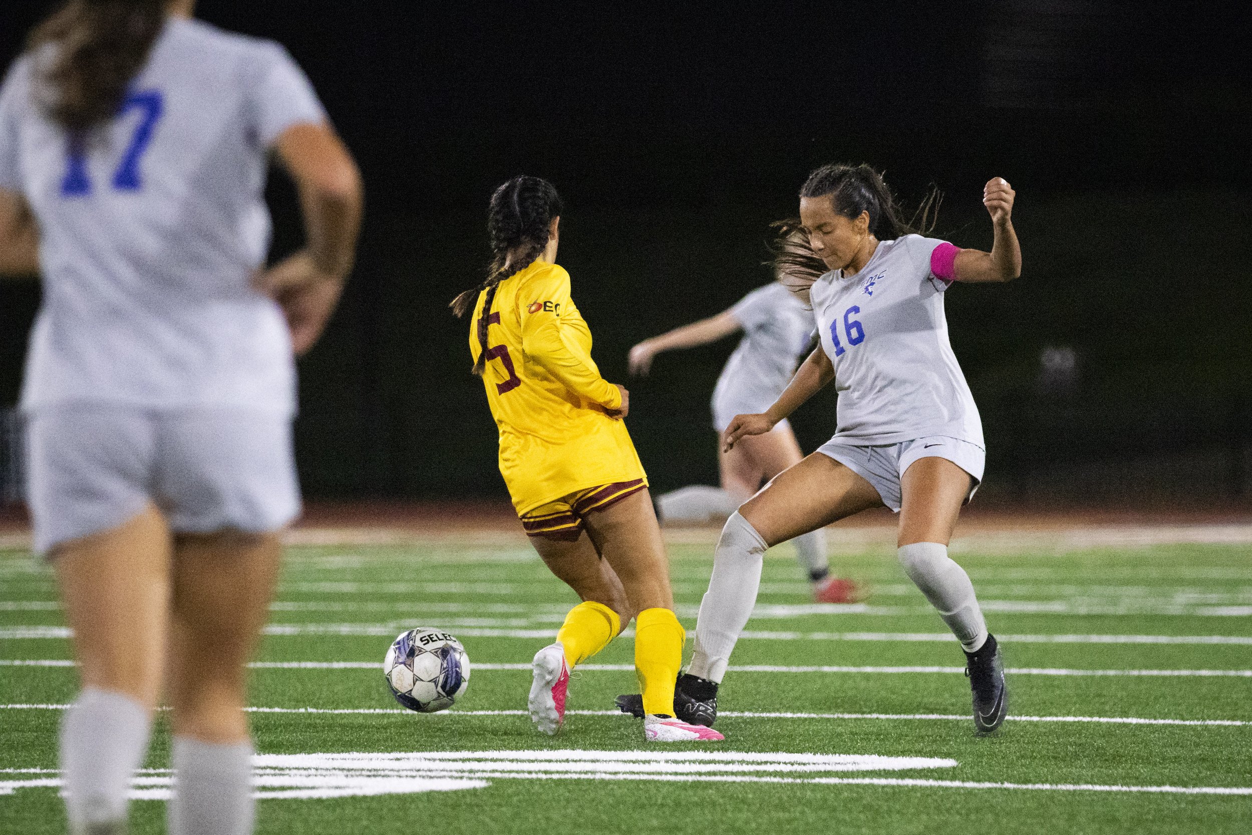  Santa Monica College Corsair defense Bella Velazco (right) looses control of the ball to Saddleback College Bobcat midfielder Danyela Jara (left) in the first half of a soccer game at Saddleback College in Mission Viejo, Calif., on Tuesday, Nov. 21,