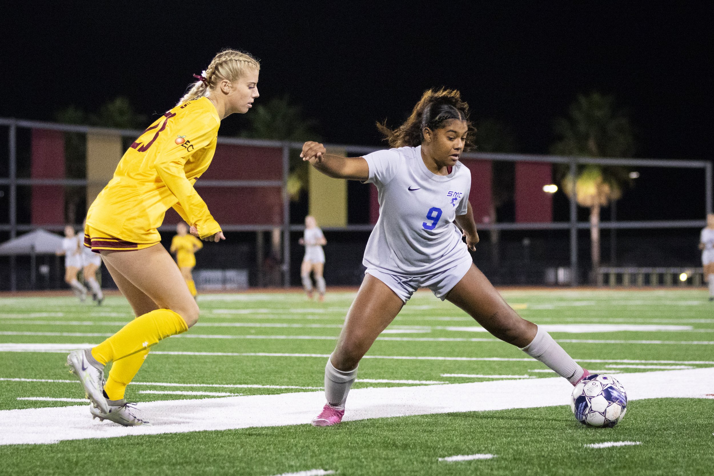  Santa Monica College Corsair forward Amarah Martinez (right) attacks while Saddleback College Bobcat’s defense Summer Hackett (left) attempts to take control of the ball in the second half of a soccer game at Saddleback College in Mission Viejo, Cal