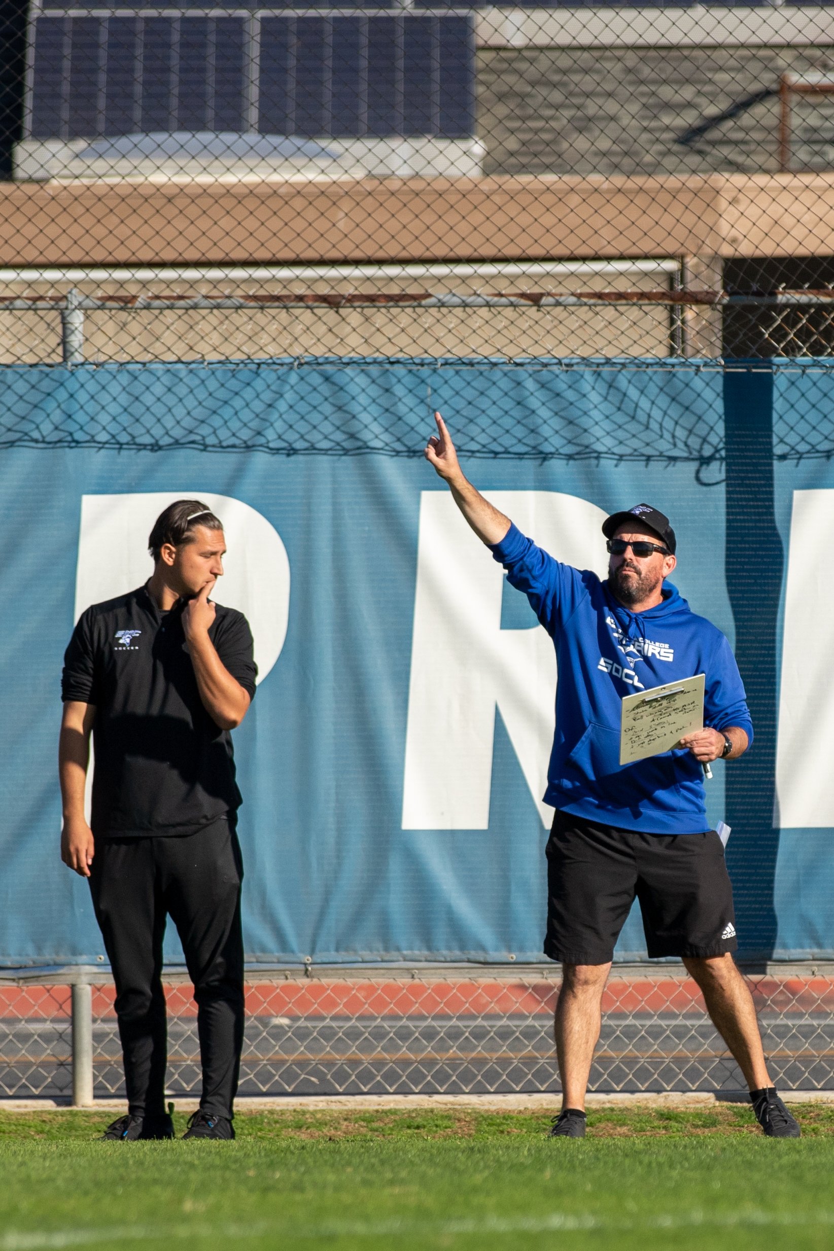  (From L to R) Santa Monica Corsairs' assistant coach Keola Paredes and head coach Aaron Benidson during the women's soccer match on Saturday, Nov. 25, 2023 at Cypress College in Cypress, Calif.  (Akemi Rico | The Corsair) 