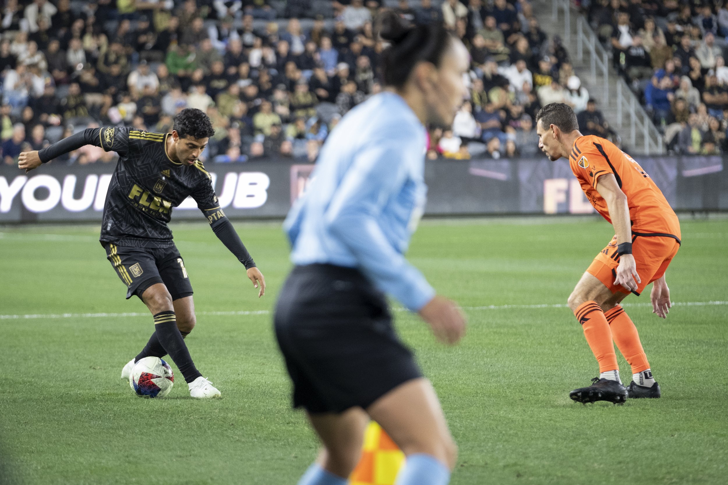  Carlos Vela, Forward #10 of LAFC, guards the ball as he advances towards the goal during the Major League Soccer (MLS) match on Wednesday, June 14, at the Bank of Montreal (BMO) Stadium in Los Angeles, California. (Anna Sophia Moltke | The Corsair) 