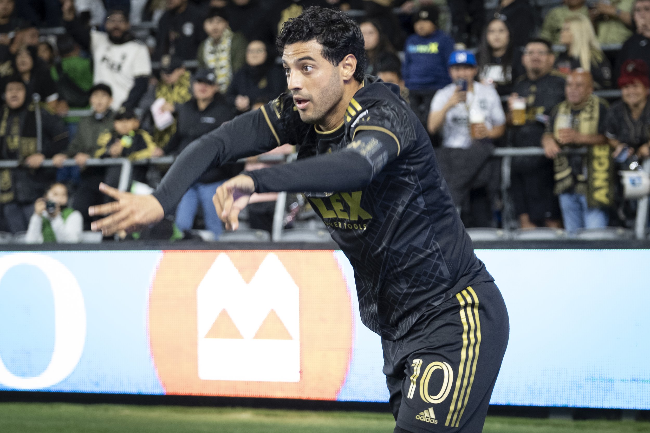  Carlos Vela, Forward #10 of LAFC, motions towards his team during the Major League Soccer (MLS) match on Wednesday, June 14, at the Bank of Montreal (BMO) Stadium in Los Angeles, California. (Anna Sophia Moltke | The Corsair) 