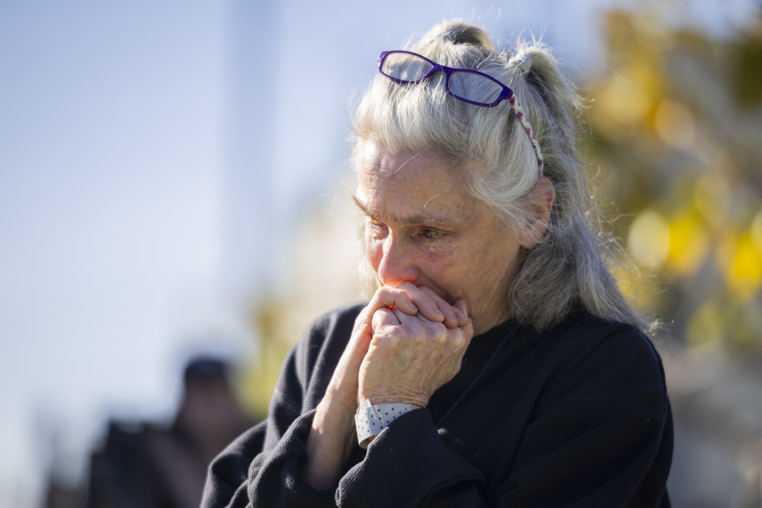  A women cries during the LA County Ceremony of the Unclaimed Dead after placing a white rose on the grave marking the 1,937 individuals who died in 2020 and either did not have next of kin, or were not claimed by their next of kin at the LA County C
