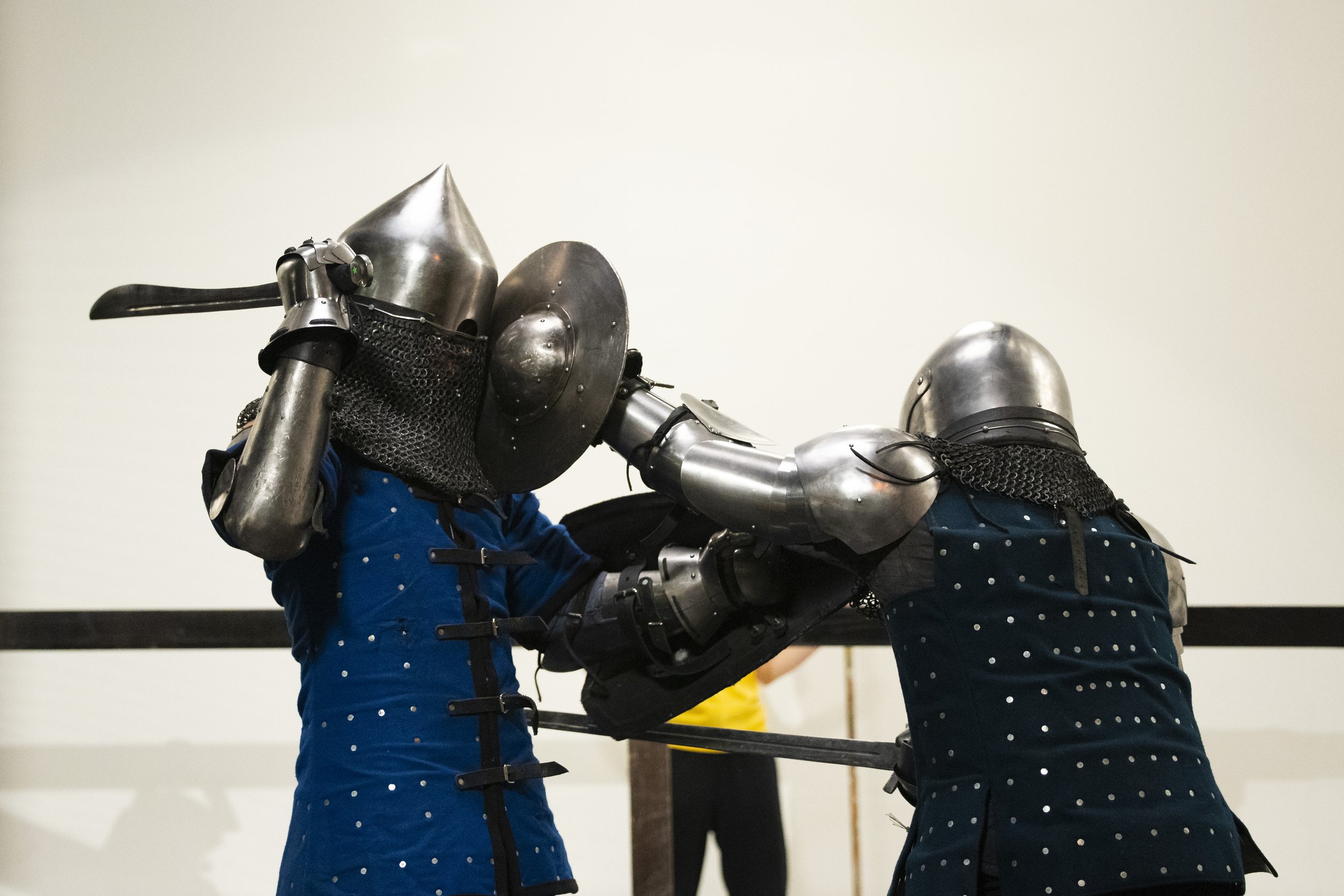  Buhurt fighters Lance Garrison (left), with the Order Draconis Fight Club, and Kenny Osorio (right), with the Los Angeles Golden Knight, brawl during Golden Ring II in Burbank, Calif., on Saturday, Dec. 16, 2023. Garrison defeated Osorio. (Caylo Sea