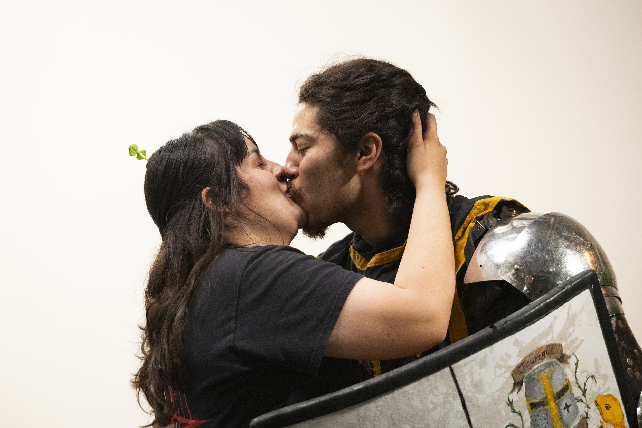  Fry Bastista and Angel Jauregui kiss after he faked an injury and proposed when she went to check on him during Golden Ring II in Burbank, Calif., on Saturday, Dec. 16, 2023. (Caylo Seals | The Corsair) 