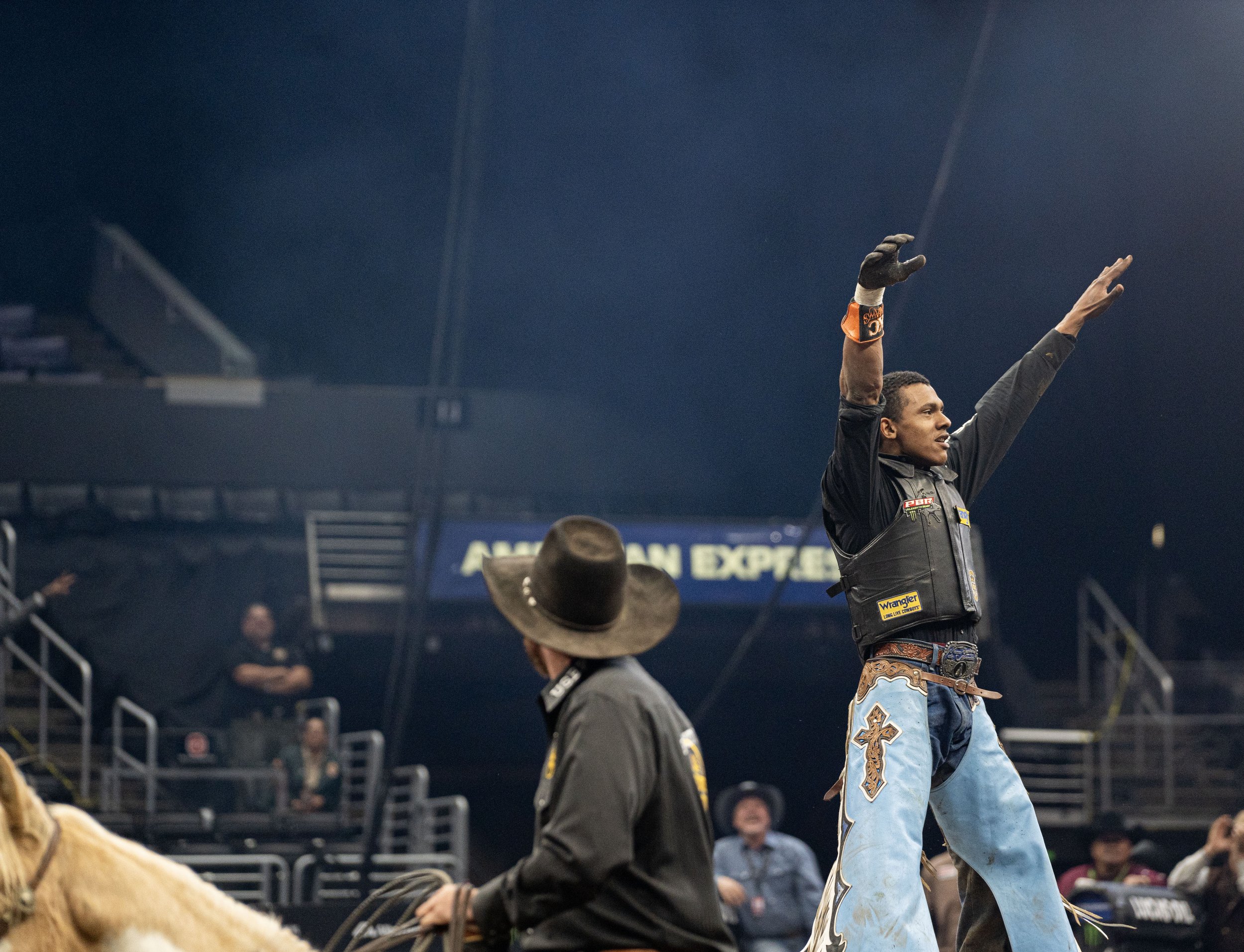  Cassio Dias celebrating as he finishes the biggest ride of his life against the best bull in the world, Man Hater, to reach first place in the Championship round on Saturday, Feb. 16, 2023. Dias is currently the best bull rider in the world and did 