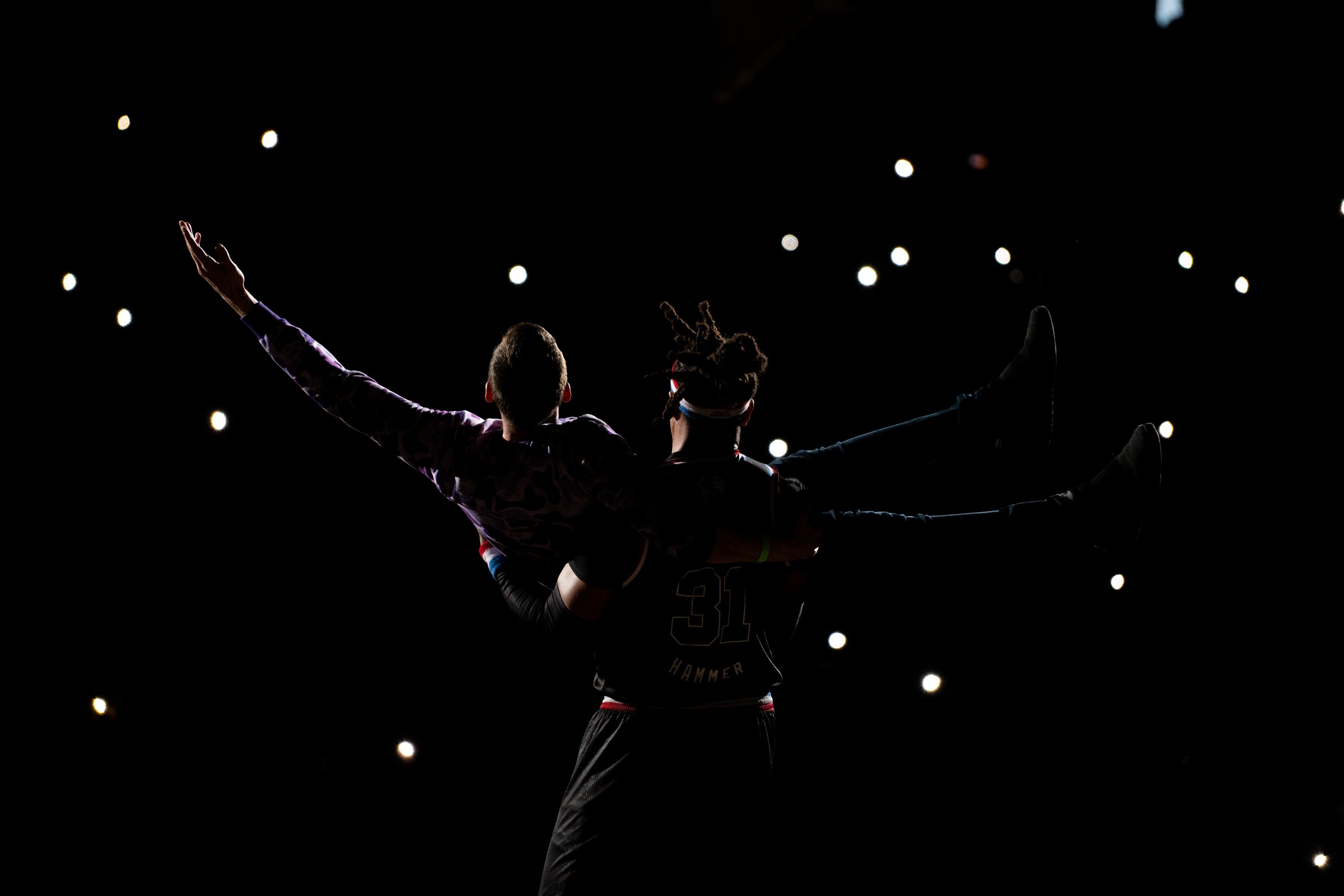 Harlem Globetrotter showman Hammer Harrison(31) holds up fan during a dance after giving him his shoe back at Toyota Arena in Ontorio, Calif. on Monday, Feb.19, 2024. (Danilo Perez | The Corsair) 