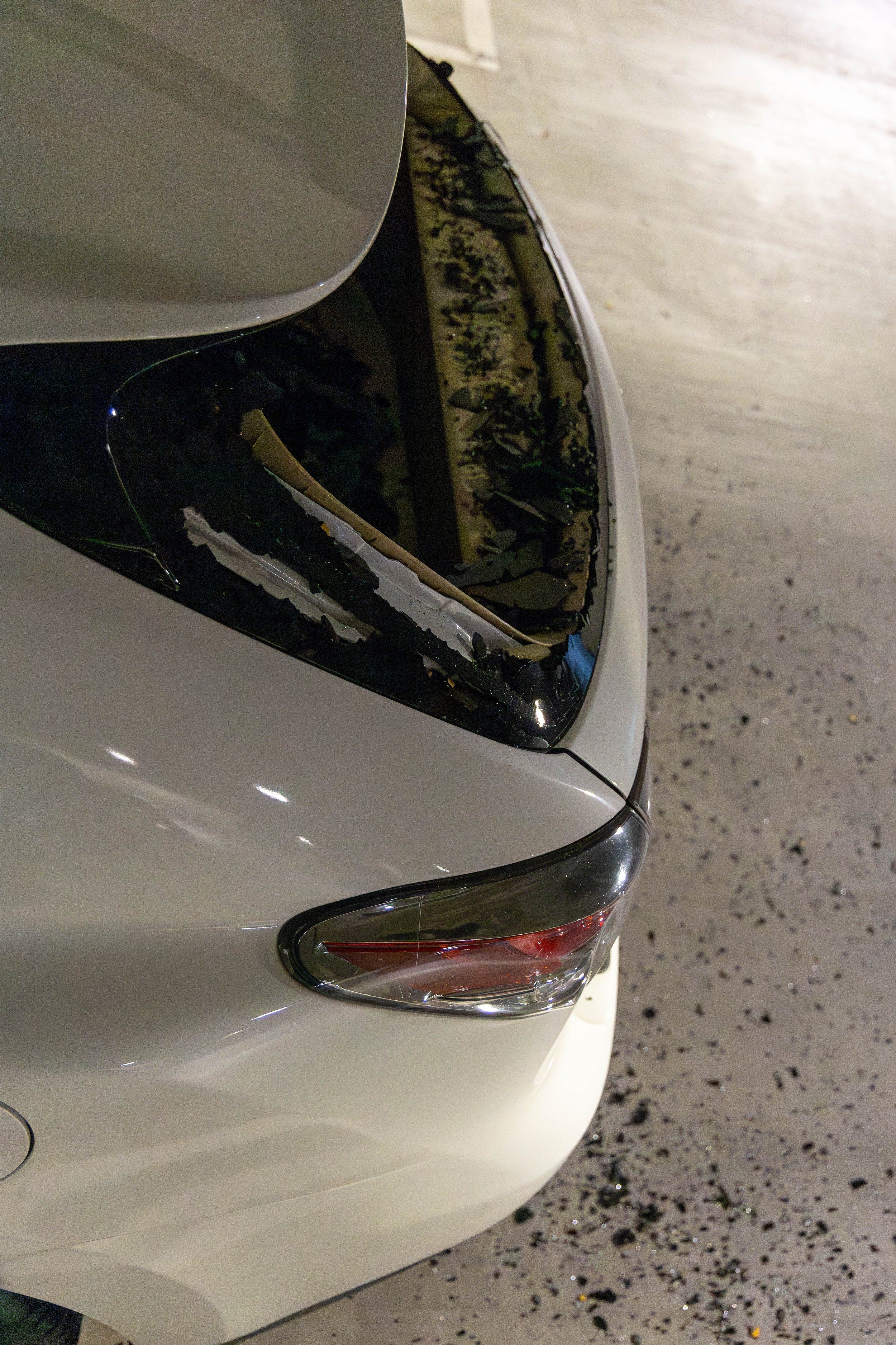  Shattered rear windshield of one of the cars that were vandalized on the Level P3 of the underground parking of Santa Monica College (SMC) Student Services building, Santa Monica, Calif., on Feb. 28, 2024. According to Mr. Olivera Santos (Grounds se