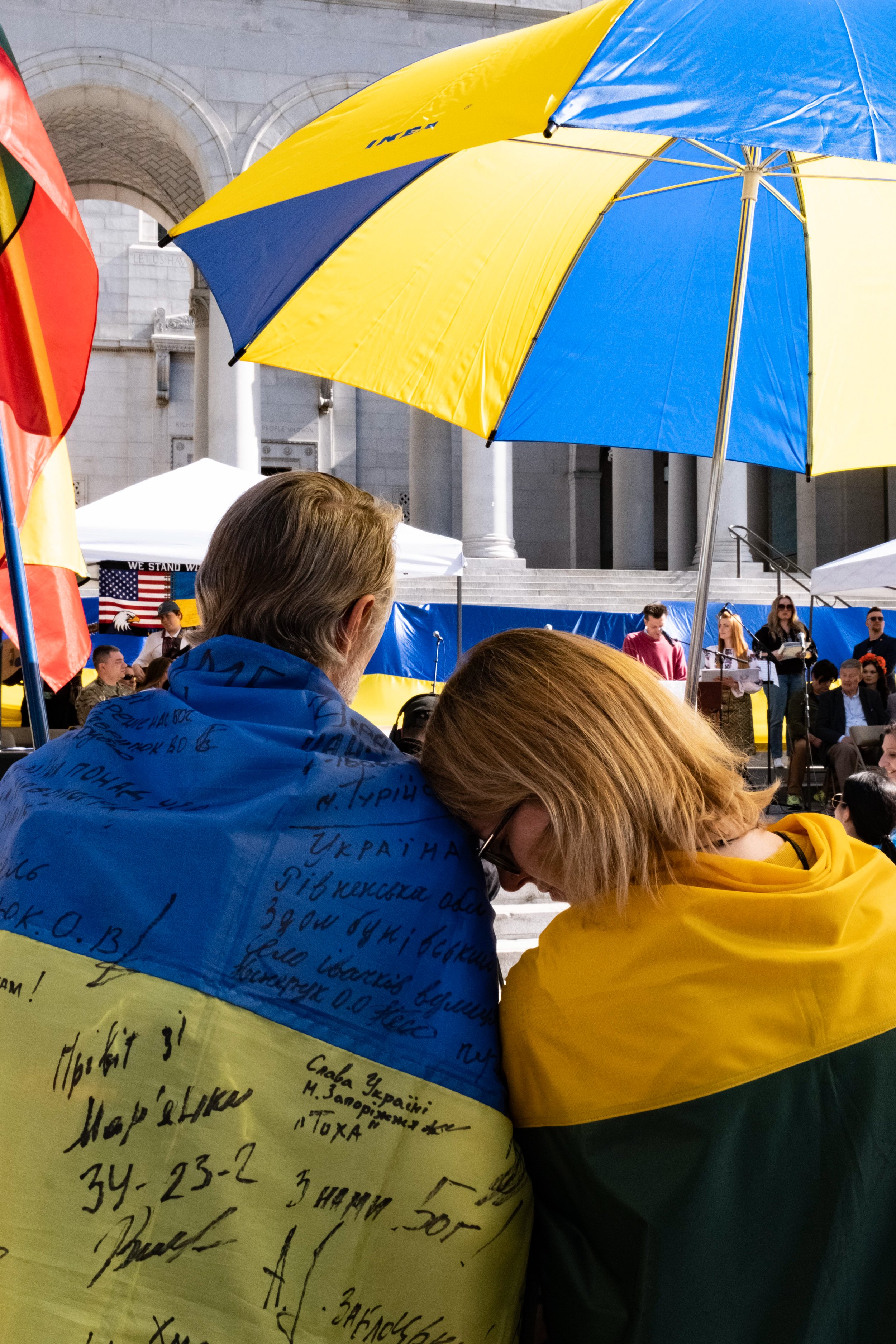  Two protesters attending second year Ukrainian war protest at Los Angeles City Hall, February 24,2024.  (Alejandro Contreras | The Corsair)  