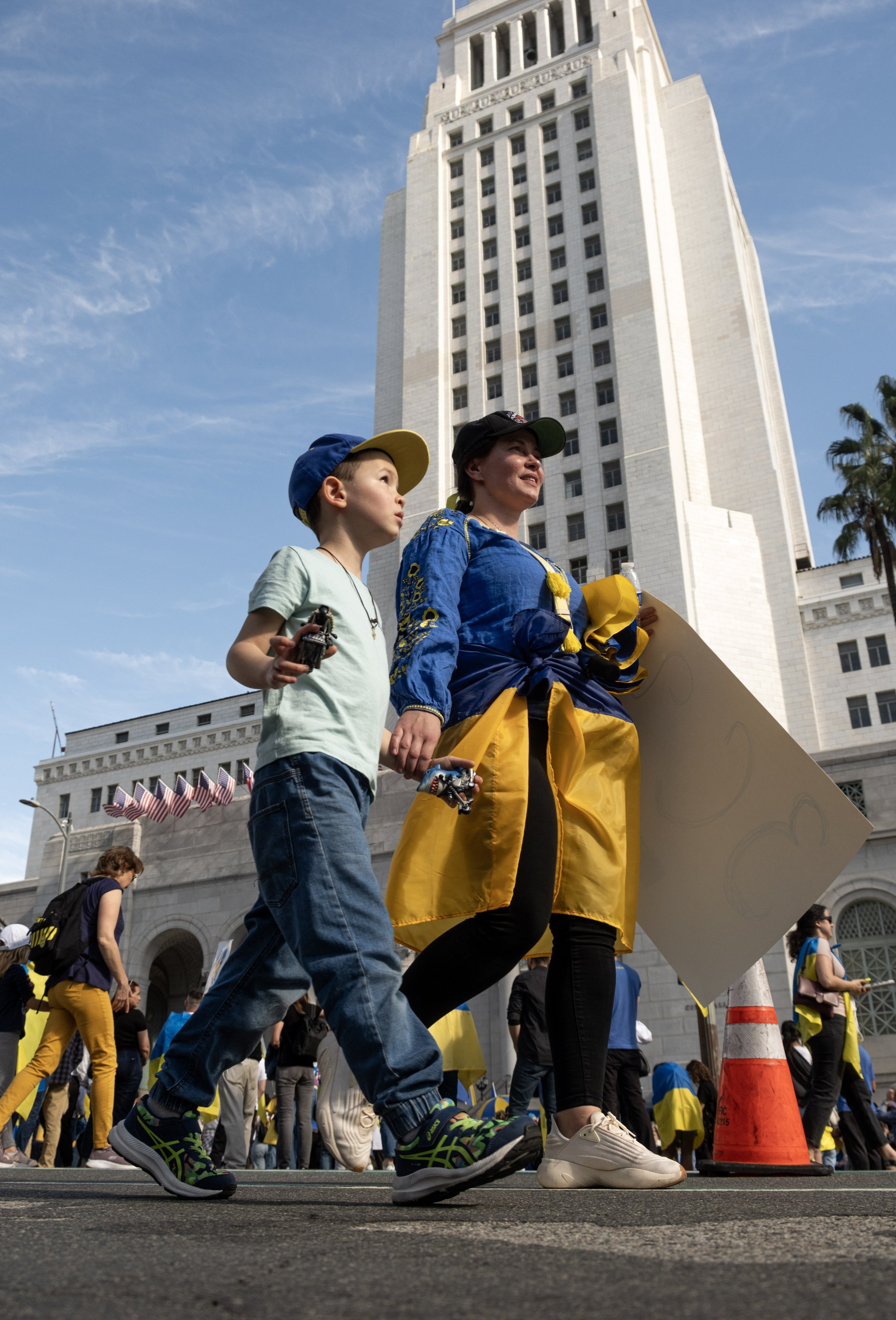  Mother and son wear the colors of the Ukrainian flag to take part in the Ukrainian war protest outside the City Hall of Los Angeles, Calif. on Saturday, Feb.24, 2024. Ukrainian supporters gathered after two-years since the start of the Russia-Ukrain