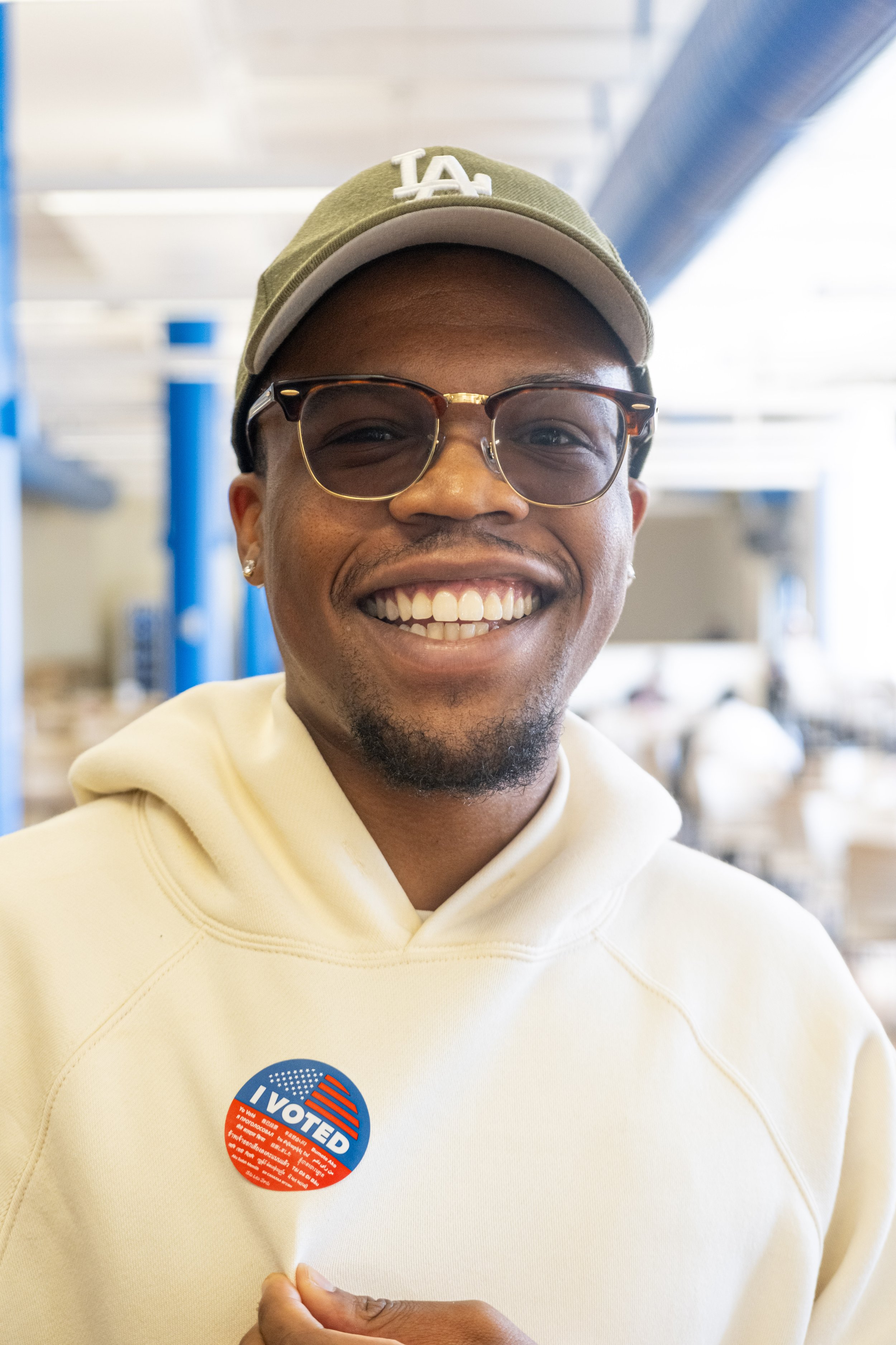  Evan White poses for a portrait as he holds out his "I Voted" sticker after casting his vote on Tuesday, March 5, 2024 for the California Presidential Primary in the Cayton Center of Santa Monica College at Santa Monica, Calif. (Danilo Perez | The C