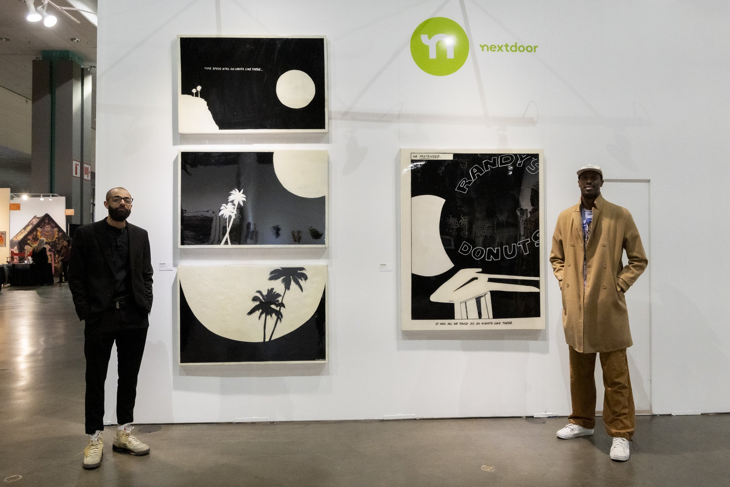  L-R curator Josiah David Jones and artist Rod Benson from neighbors of Next-door partnered with LA Art Show in honor of Black History Month to celebrate the power of community and art at the four day LA Art Show Showcase presented at the Convention 