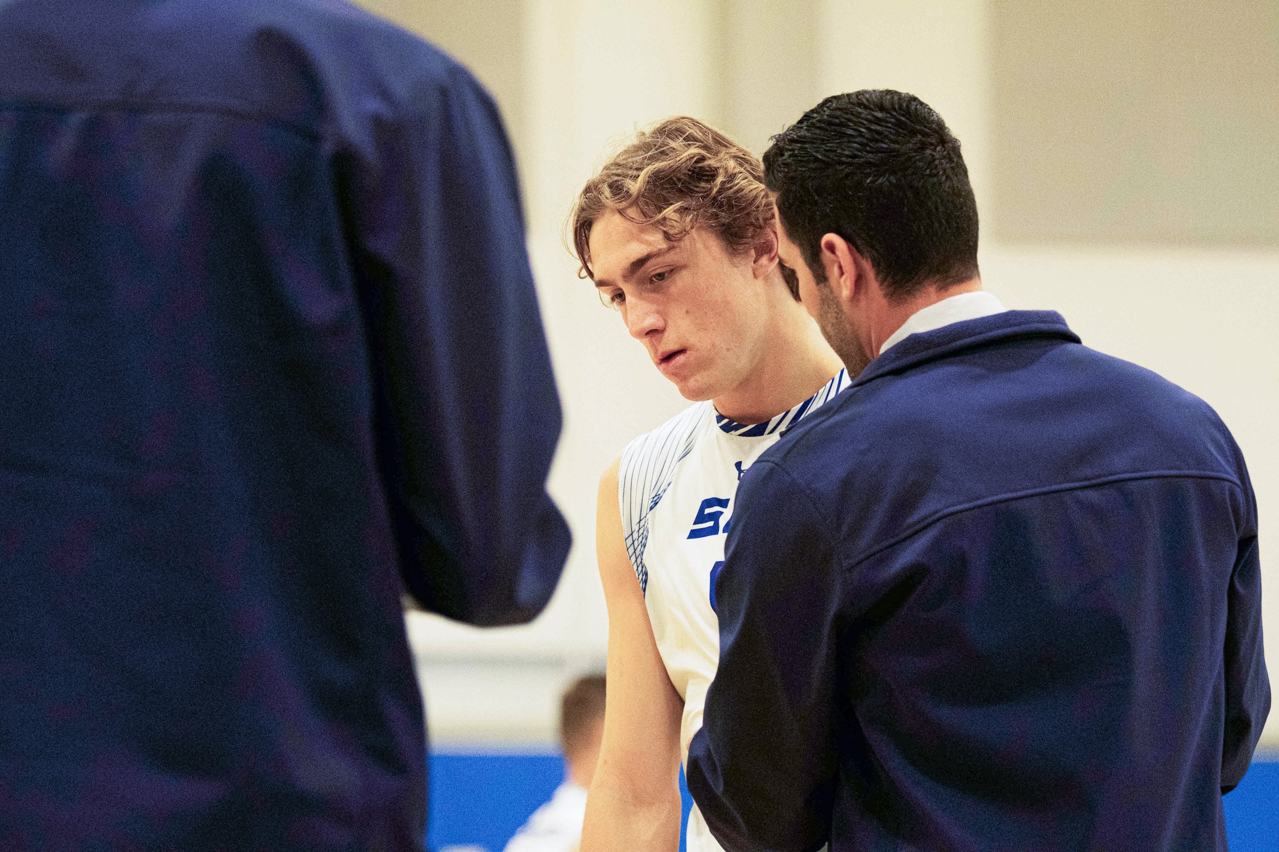  Santa Monica College Outside Hitter Bryce Bowsher consults with the Corsairs Mens Volleyball Coach Liran Zamir  at the SMC Pavilion Gym in Santa Monica, Calif., on Wednesday, March 6,2024 (The Corsair | Jamael Shotomide) 