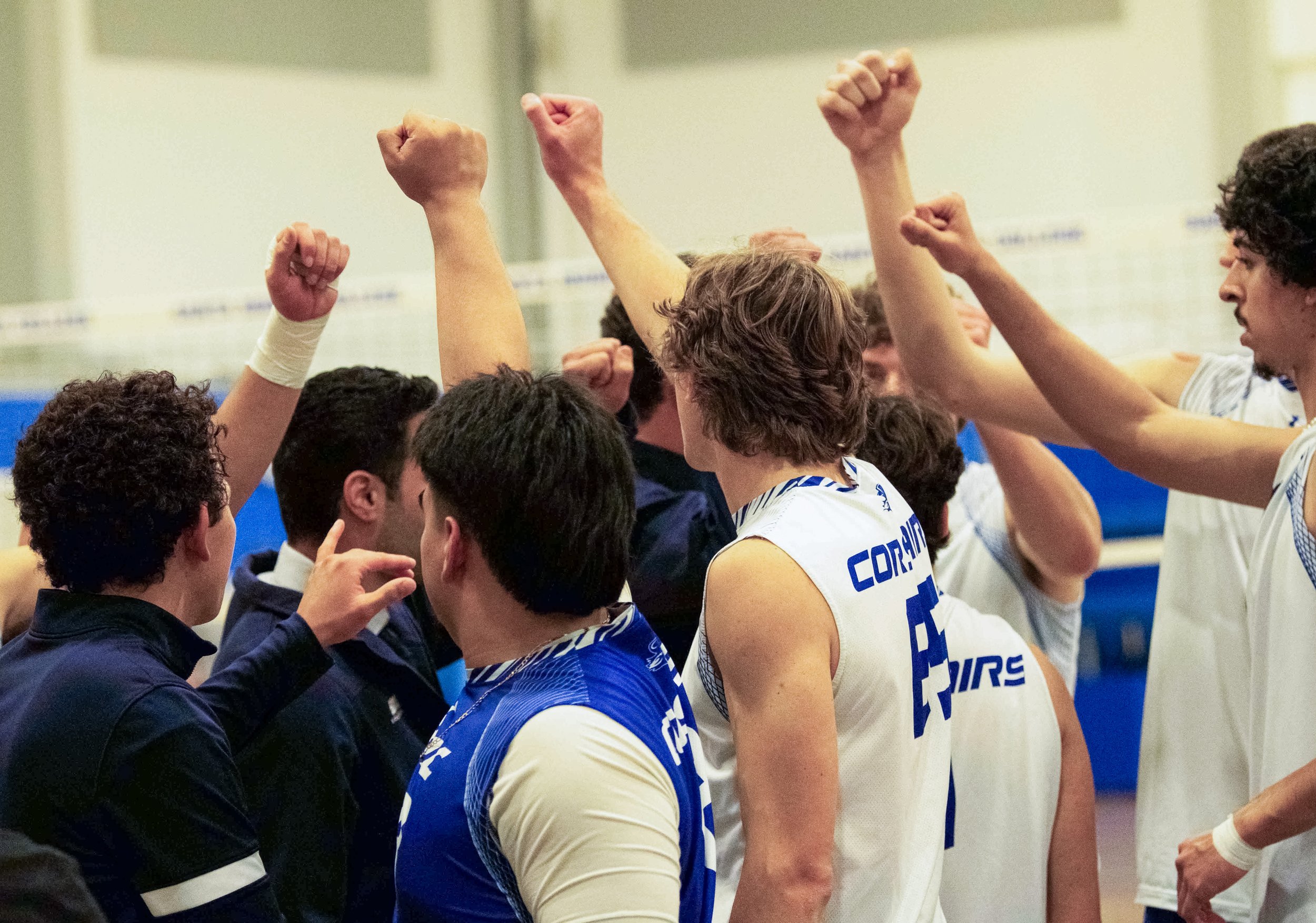  The Santa Monica College Mens Volleyball team all raise their fists during a timeout at the SMC Pavilion Gym in Santa Monica, Calif., on Wednesday, March 6,2024 (The Corsair | Jamael Shotomide) 