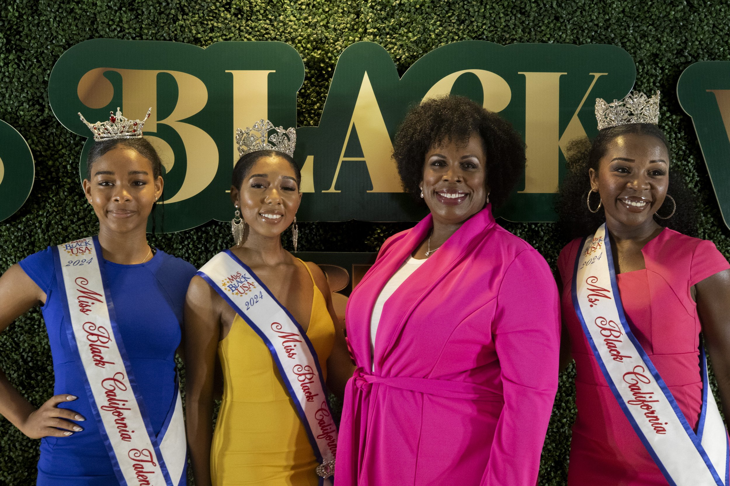  Attendees of the Black Business Assocation event pose for photos on the red carpet in Inglewood, Calif., on March 23, 2024.  (Corsair Photo: Luca Martinez) 