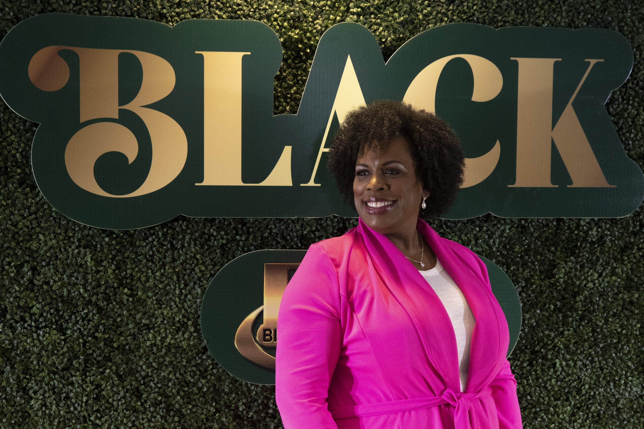  Attendees of the Black Business Assocation event pose for photos on the red carpet in Inglewood, Calif., on March 23, 2024.  (Corsair Photo: Luca Martinez) 