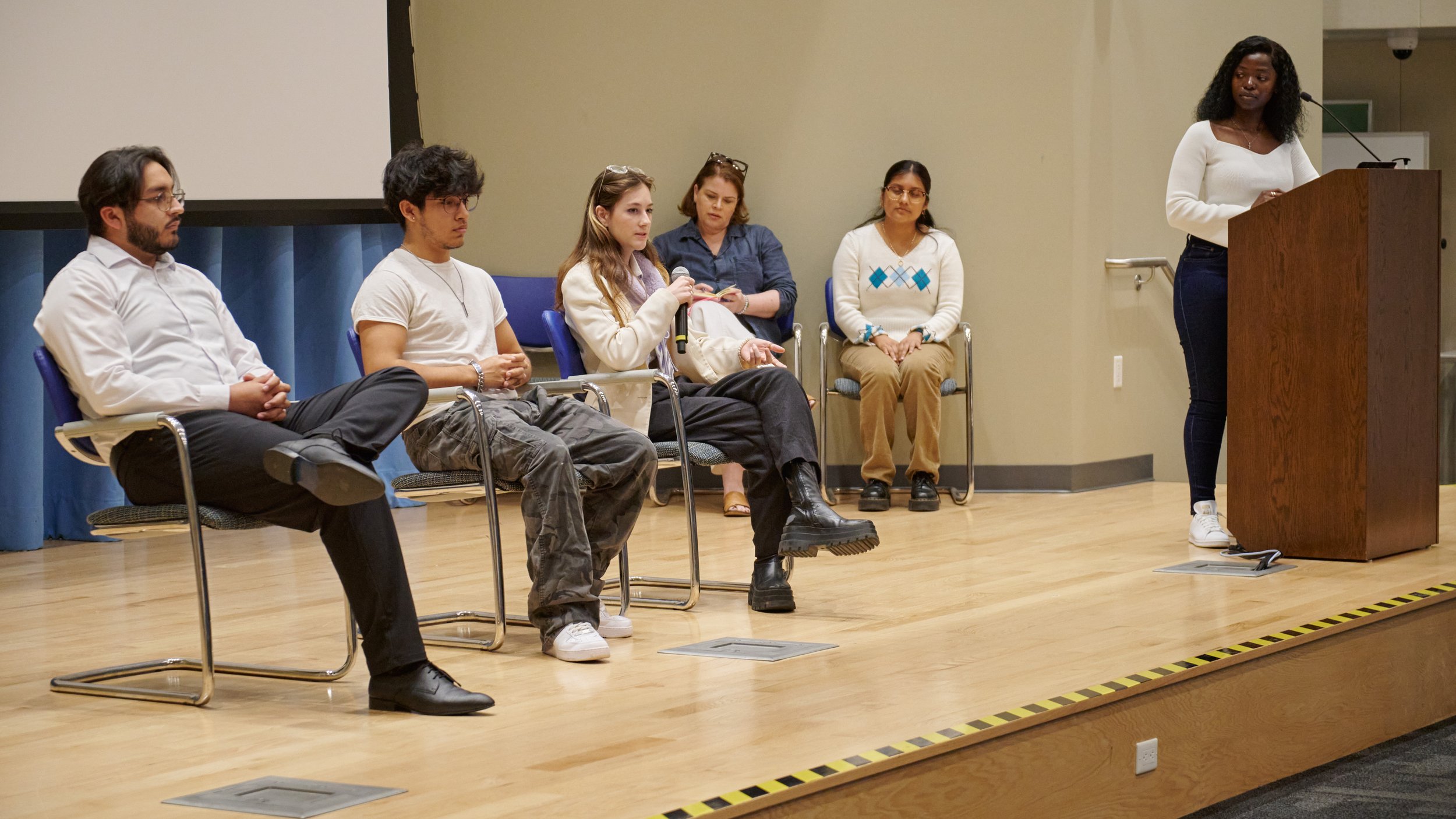  The Corsair's Editor-in-Chief, Cebelihle Hlatshwayo (right), interviews the candidates for the position of Associated Students Director of Activies (from left): Javier Rodriguez, Andre Villavicencio, and Andrea Giraldo during the A.S. candidates for