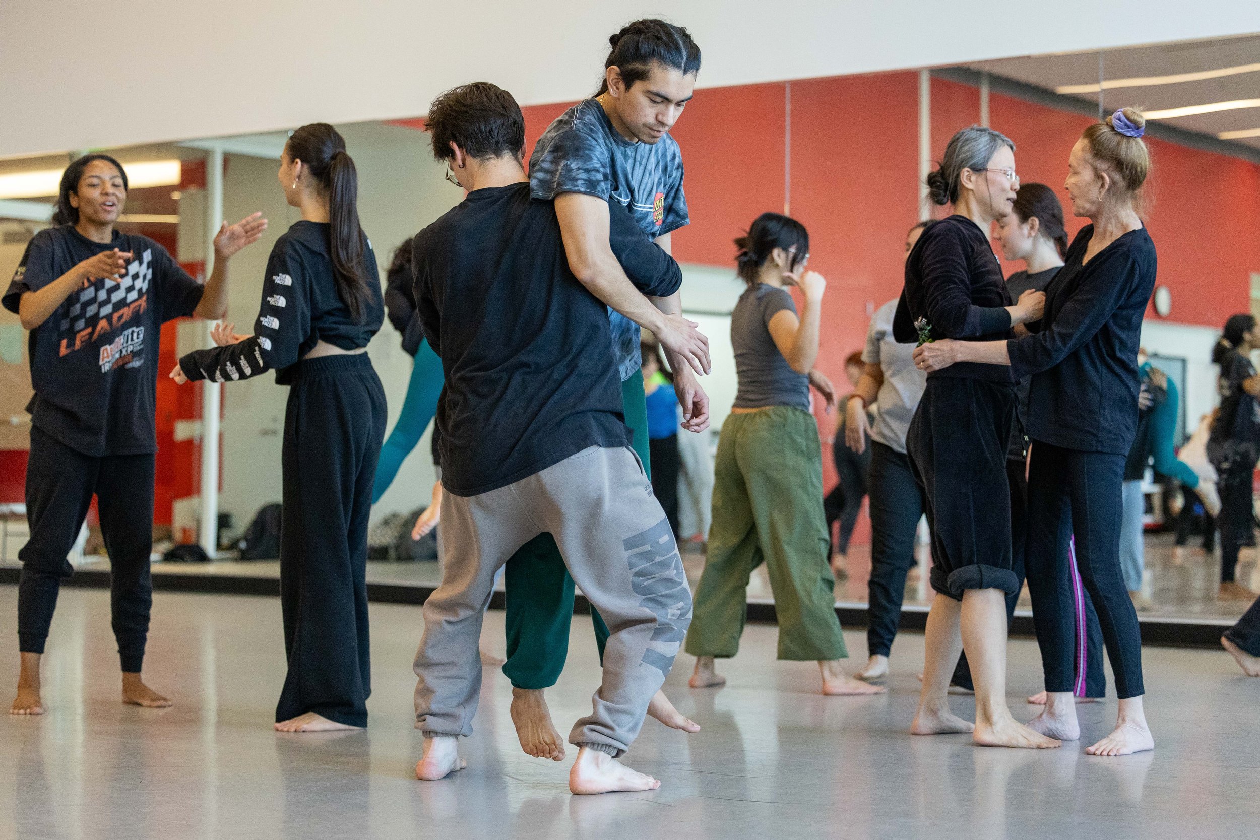  Attendees of various age, background and level of preparation practice a newly learned move as part of ‘Volta Collective: Colliding Bodies’ event at Santa Monica College (SMC), Santa Monica, Calif., on Thursday, March 14, 2024. The event is a part o