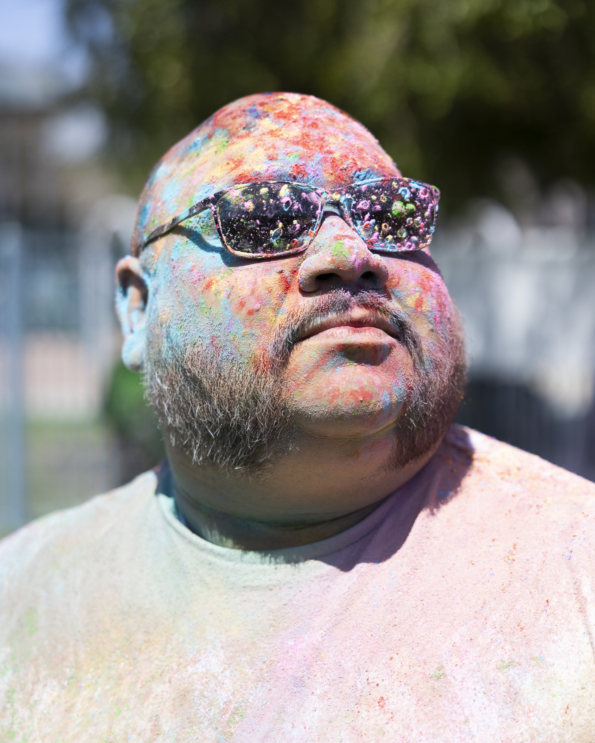  Eric Valadez poses for a portrait at the second annual Venice Holi Celebration at Penmar Park in Los Angeles, Calif., on Sunday, April 7, 2024. He believes it is important to celebrate holidays in general, and that Holi is good cultural experience f