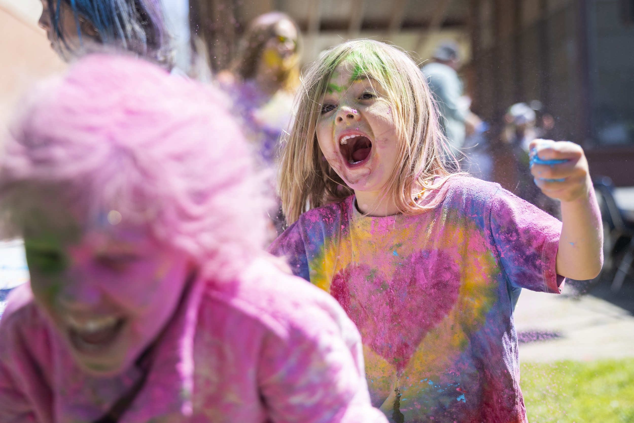  A child throws Holi powder on another child during the second annual Venice Holi Celebration at Penmar Park in Los Angeles, Calif., on Sunday, April 7, 2024. Holi, also know as the Festival of Colors, Love, and Spring, is a Hindu festival that celeb