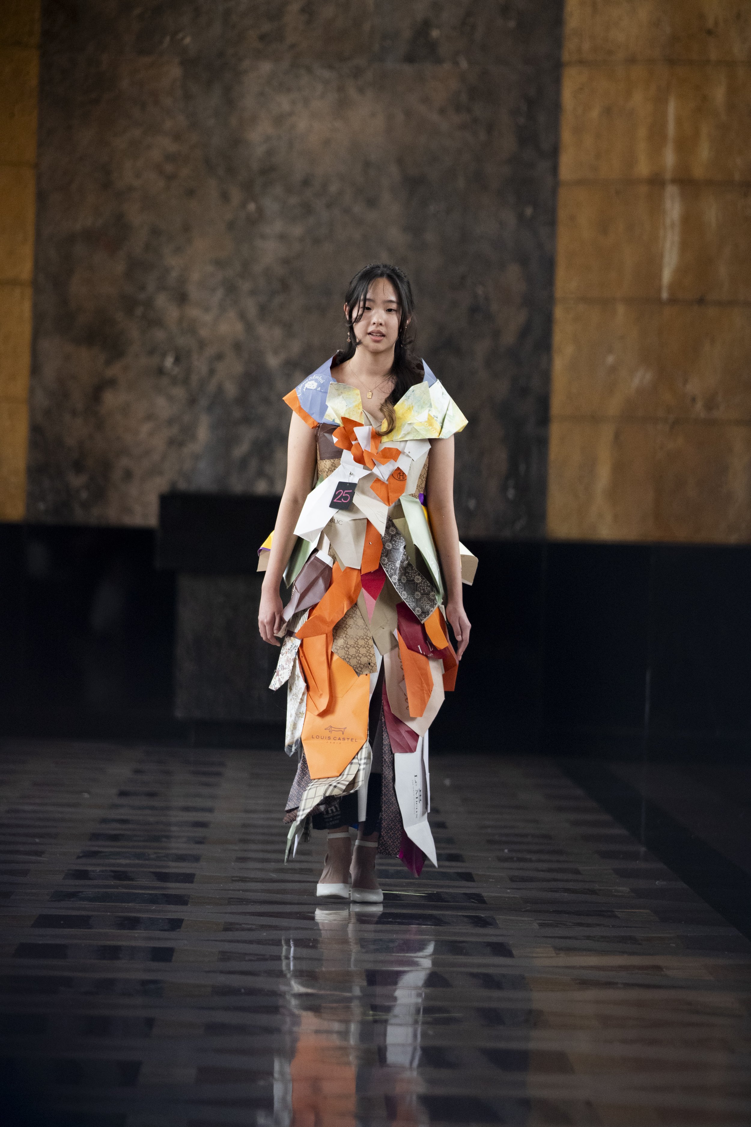  Model shows off a colorful and sustainable dress during the fashion show at Union Station. Downtown Los Angeles, CA. on April 21, 2024.  (Corsair Photo: Luca Martinez) 
