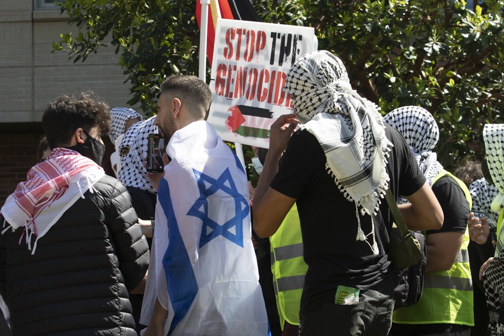  Pro-Israeli demonstrator being pushed out of  the Pro-Palestine rally by Pro-Palestine demonstrators Sunday, April 28, 2024 University of California Los Angeles, UCLA, Los Angeles, Calif. ( Laurel Rahn | The Corsair ) 