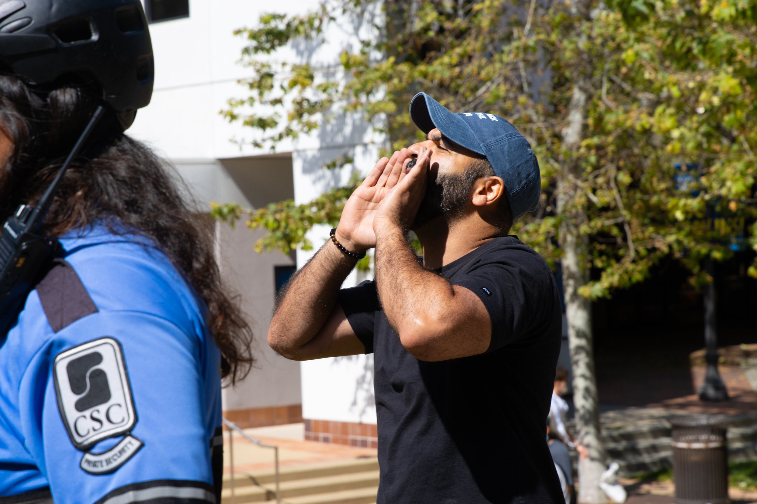  Rami, a Israeli supporter, shouts responses at pro-Palestine protestors on the other side of a human barrier formed by students and staff at University of California, Los Angeles, Calif. Sunday, April 28, 2024 (Libna Florencio | The Corsair) 