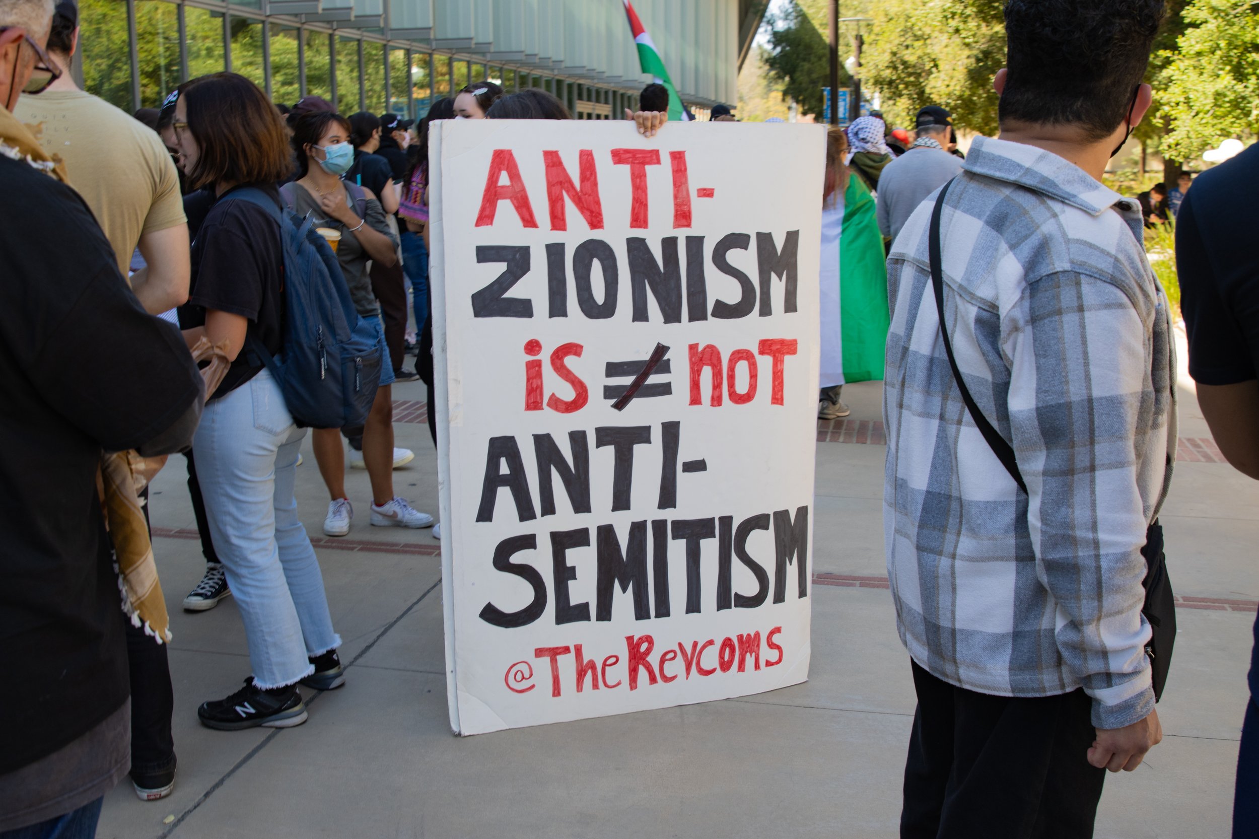  "Anti-zionism is not anti-semitism" sign held by Palestinian supporter and member of the 'Revolutionary Communists' at University of California, Los Angeles, Calif. Sunday, April 28, 2024 (Libna Florencio | The Corsair) 