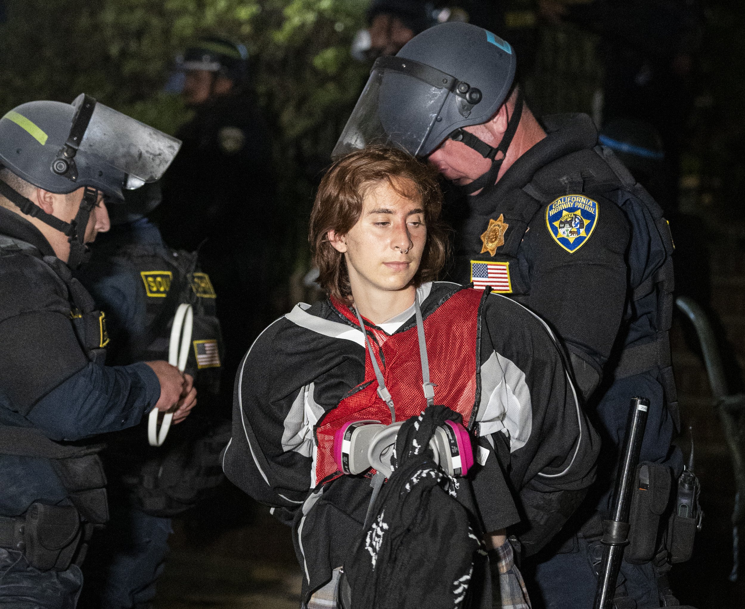  Pro-Palastinian supporter gets arrested by the California Highway Patrol's Special Operations Unit on Wednesday, May 1 at the University of California, Los Angeles in Los Angeles, Calif. (Danilo Perez | The Corsair) 