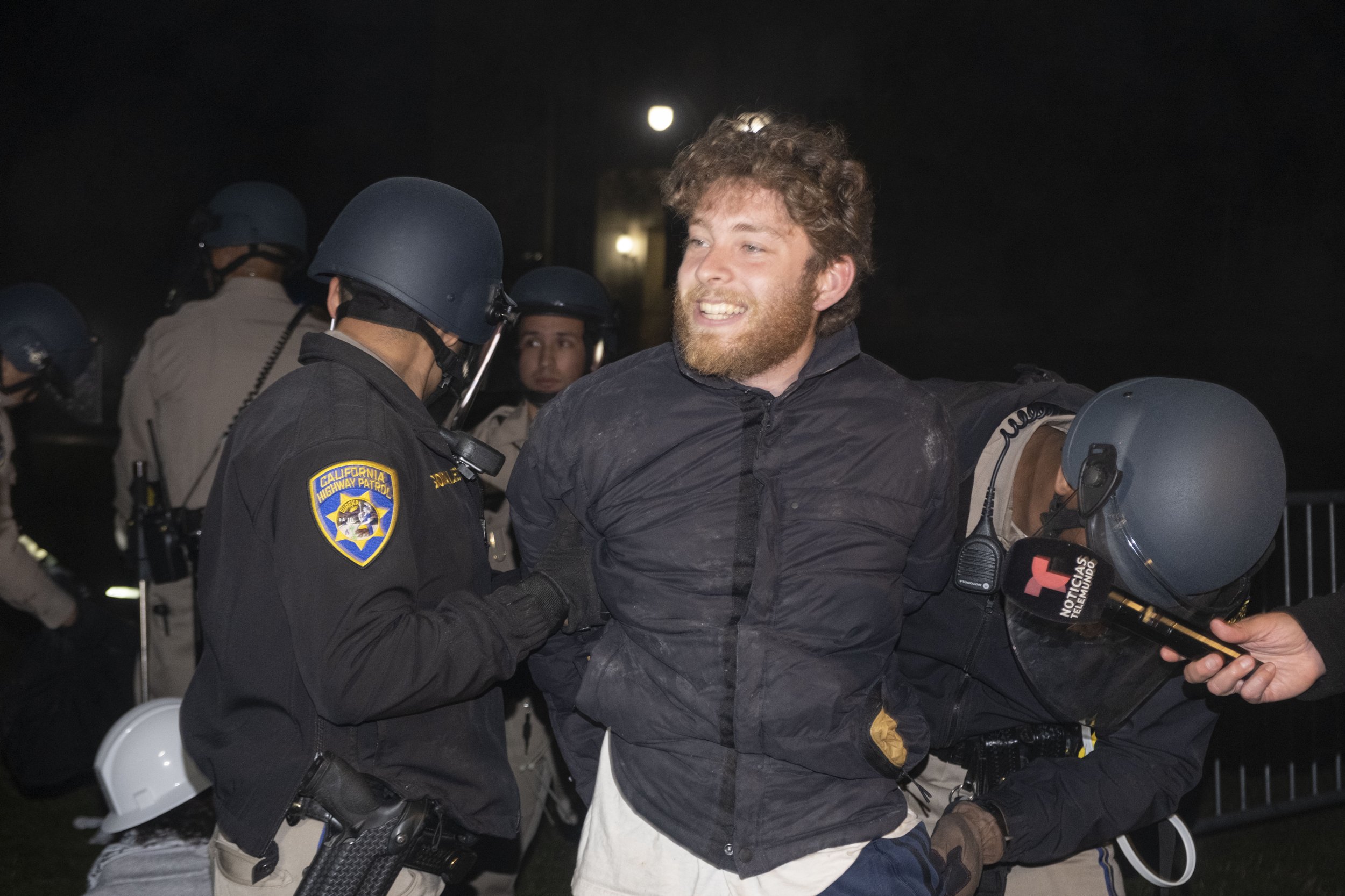  California Highway Patrol search pro-palastinian suporter after being arrested on Wednesday, May 1 at Los Angeles, Calif. (Danilo Perez | The Corsair) 