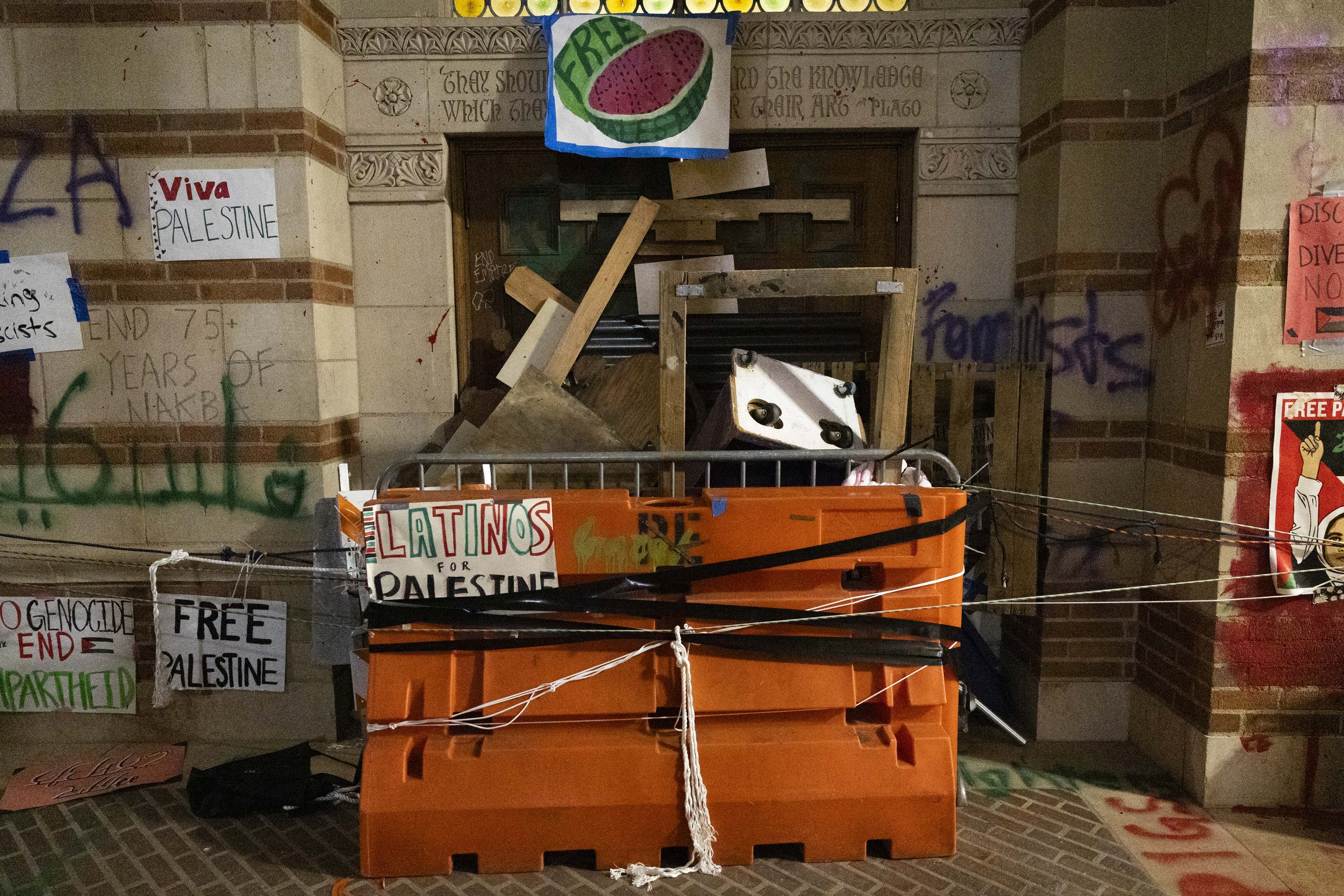  Protesters built barricades against the doors to Royce Hall in the encampment supporting Gaza in the Israeli-Palestine Conflict at the University of California, Los Angeles in Los Angeles, Calif., on Thursday, May 2, 2024. Protesters were ordered to