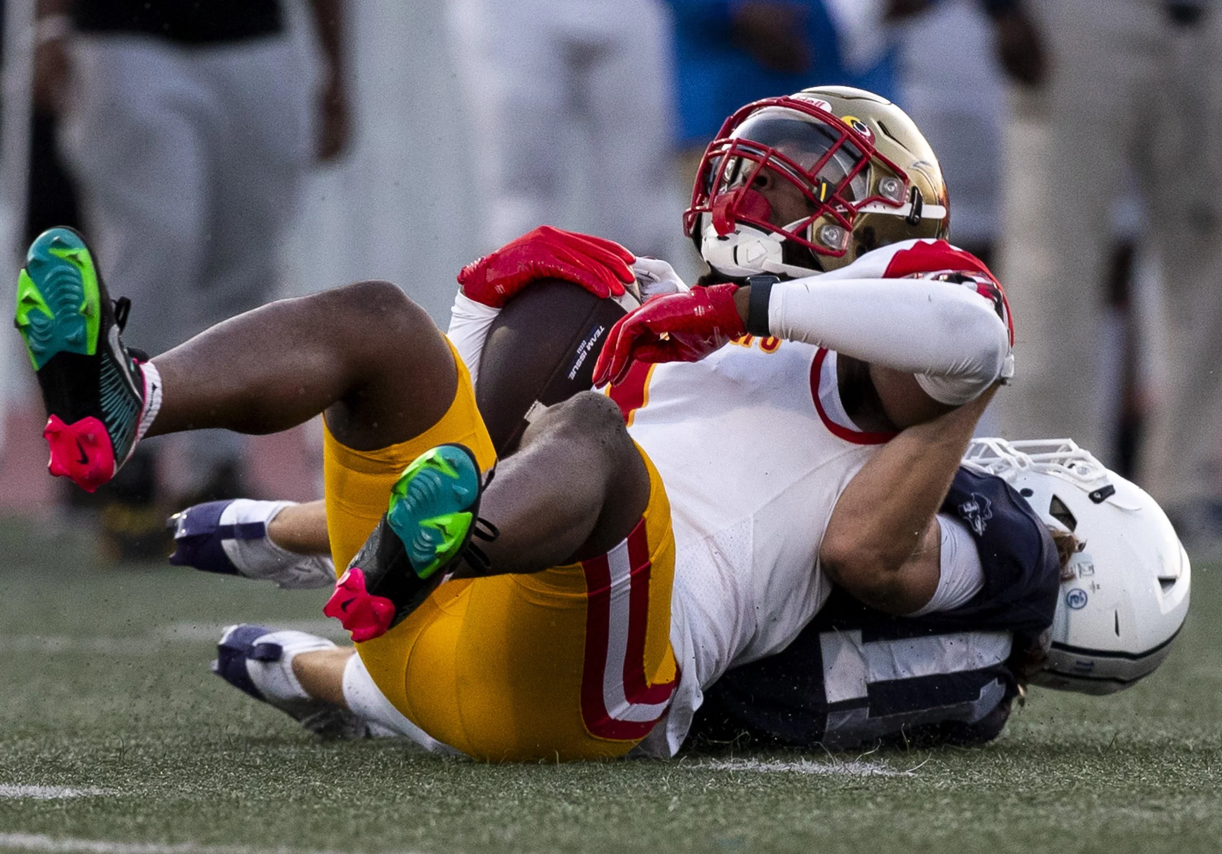 Santa Monica College's Daniel HIildebrand (11) tackles Desert’s wide receiver Michael Jenkins, Jr. (1) on Saturday, Sept. 14, 2024 at the Corsair Field in Santa Monica, Calif. Santa Monica College football defeated College of the Desert 24-10. (The 