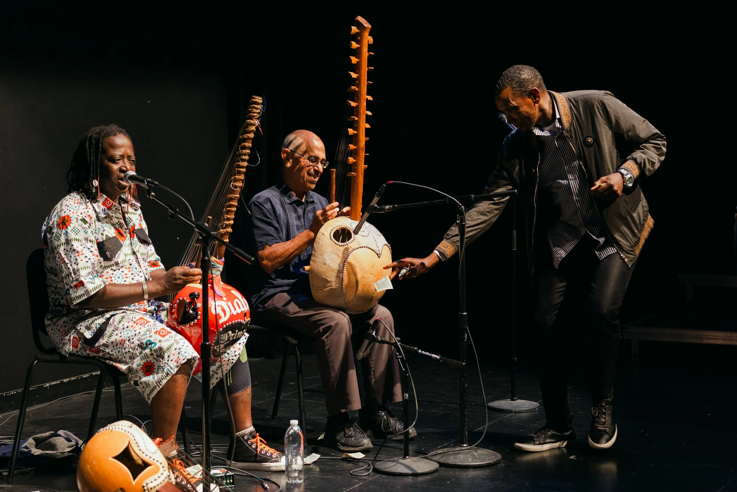  Audience members "sprayed money" at the musicians following a traditional West African custom  on Thursday Sept. 19, 2024 in Santa Monica, Calif. (Mary Funsten | Corsair) 
