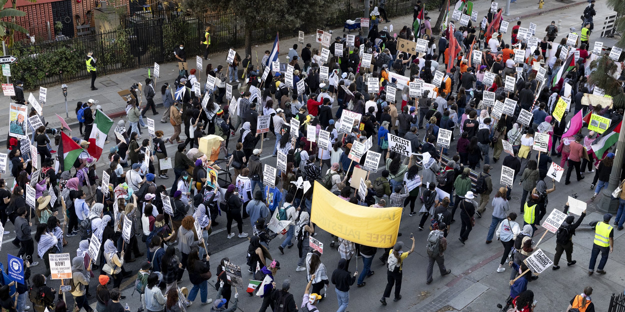 Protesters march down the streets of downtown Los Angeles during the We Fight Back protest to call for the “defeat of Trump’s Extreme-Right Billionaire Agenda,” on Monday, January 20, 2025, in downtown Los Angeles, Calif. (Jake Crandall | The Corsai