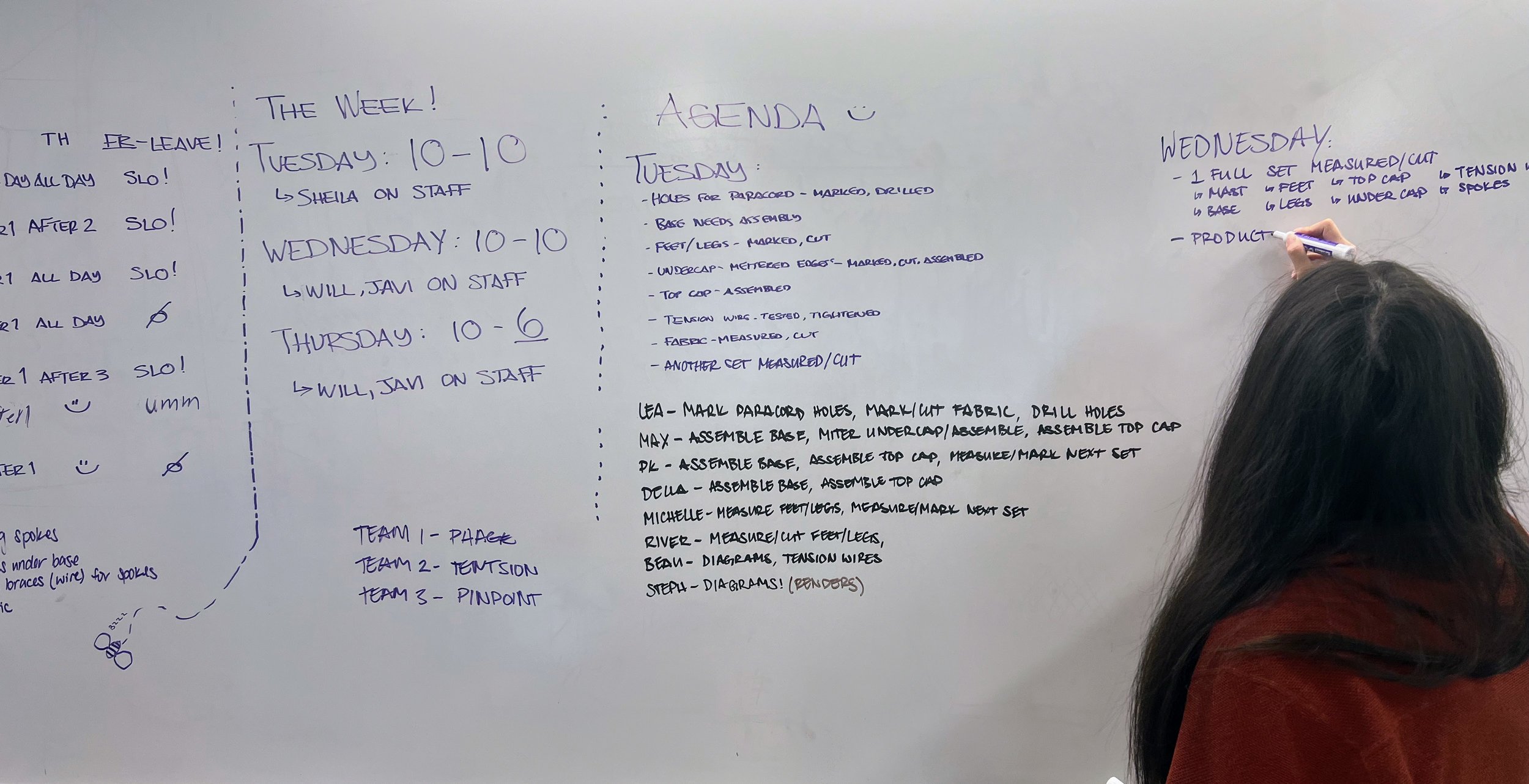 Lea Jacobson, from the Department of Interior Design, updates the weekly group agenda and production schedule on a whiteboard in the design lab at Santa Monica College Center for Media & Design in Santa Monica, Calif., on Tuesday, April 22, 202