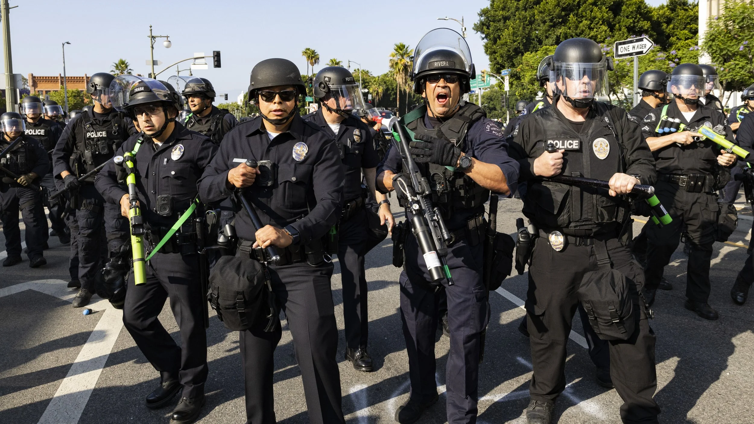 LAPD pushes protesters back during a demonstration in front of the Federal building in downtown Los Angeles, Calif., on Monday, June 9, 2025, during the fourth day of protests in a row after a recent wave of ICE deportations. (Jake Crandall | The Co