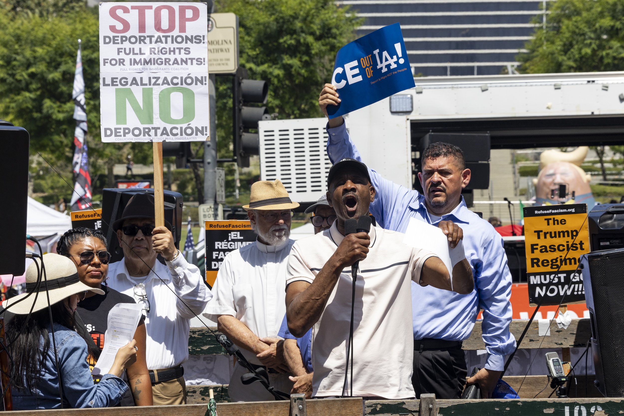 Protesters rally and give speeches in front of City Hall in Los Angeles, Calif., on Friday, July 4, 2025. 50501 SOCAL organized a protest called End The Occupation, criticizing the Trump administration’s passing of the Big Beautiful Bill and calling