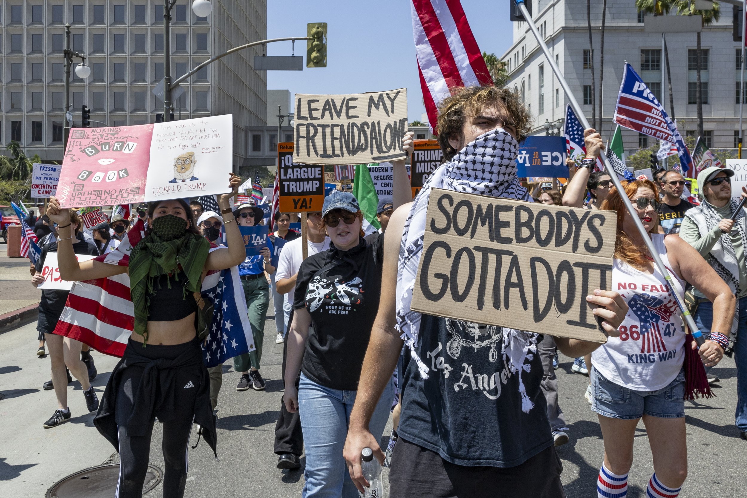 Protesters march in downtown Los Angeles, Calif., on Friday, July 4, 2025. 50501 SOCAL organized a protest called End The Occupation, criticizing the Trump administration’s passing of the Big Beautiful Bill and calling for a stop to the ongoing ICE