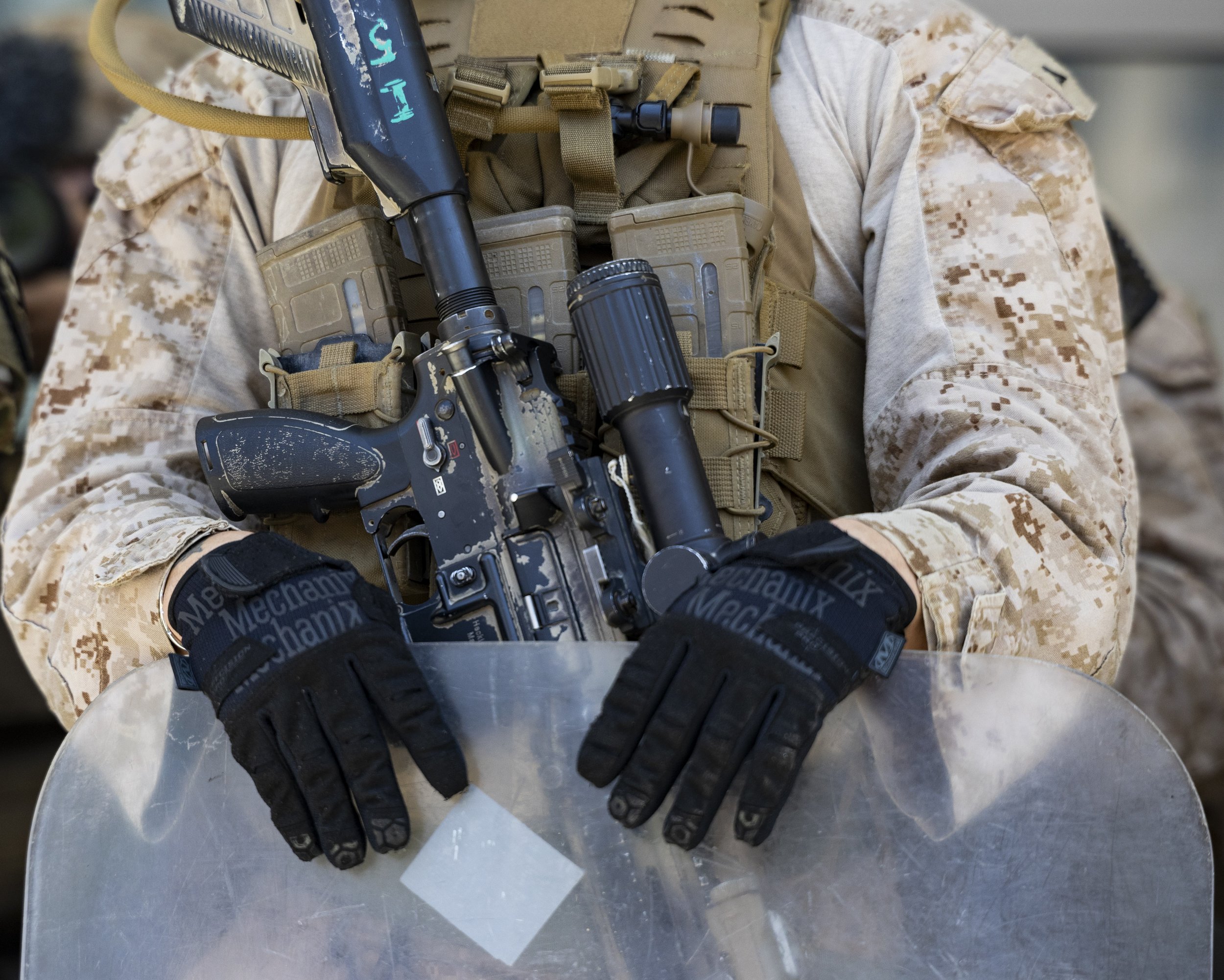 Marines stand guard with their riot shields and rifles as they face off against protesters at the Federal Building in Los Angeles, Calif., on Friday, July 4, 2025. 50501 SOCAL organized a protest called End The Occupation, criticizing the Trump admi