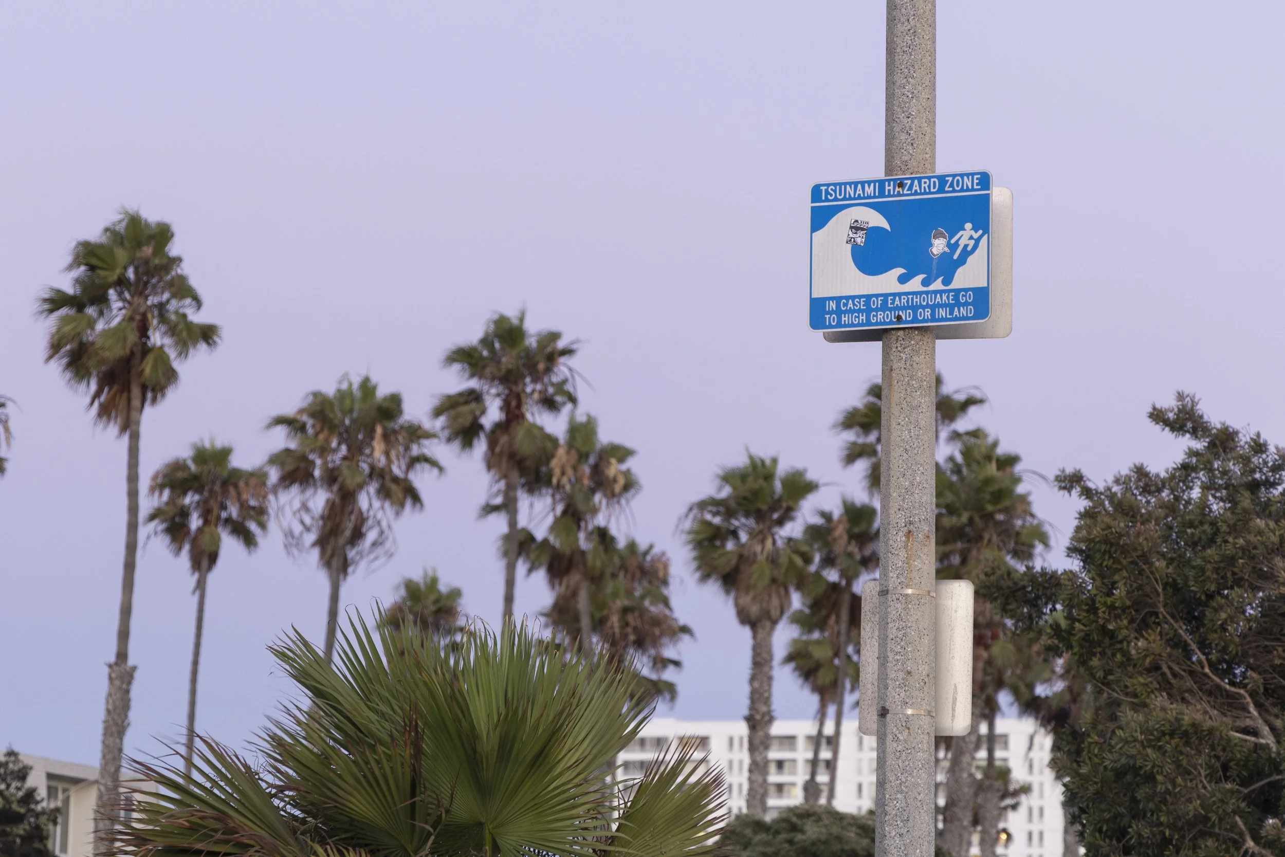  A Tsunami Hazard Zone sign shows the way to higher grounds at Beach Parking Lot 4 South at Hollister Avenue in Santa Monica, Calif., on Tuesday, July 29, 2025. A Tsunami advisory was issued for the California coast after a massive Russian earthquake