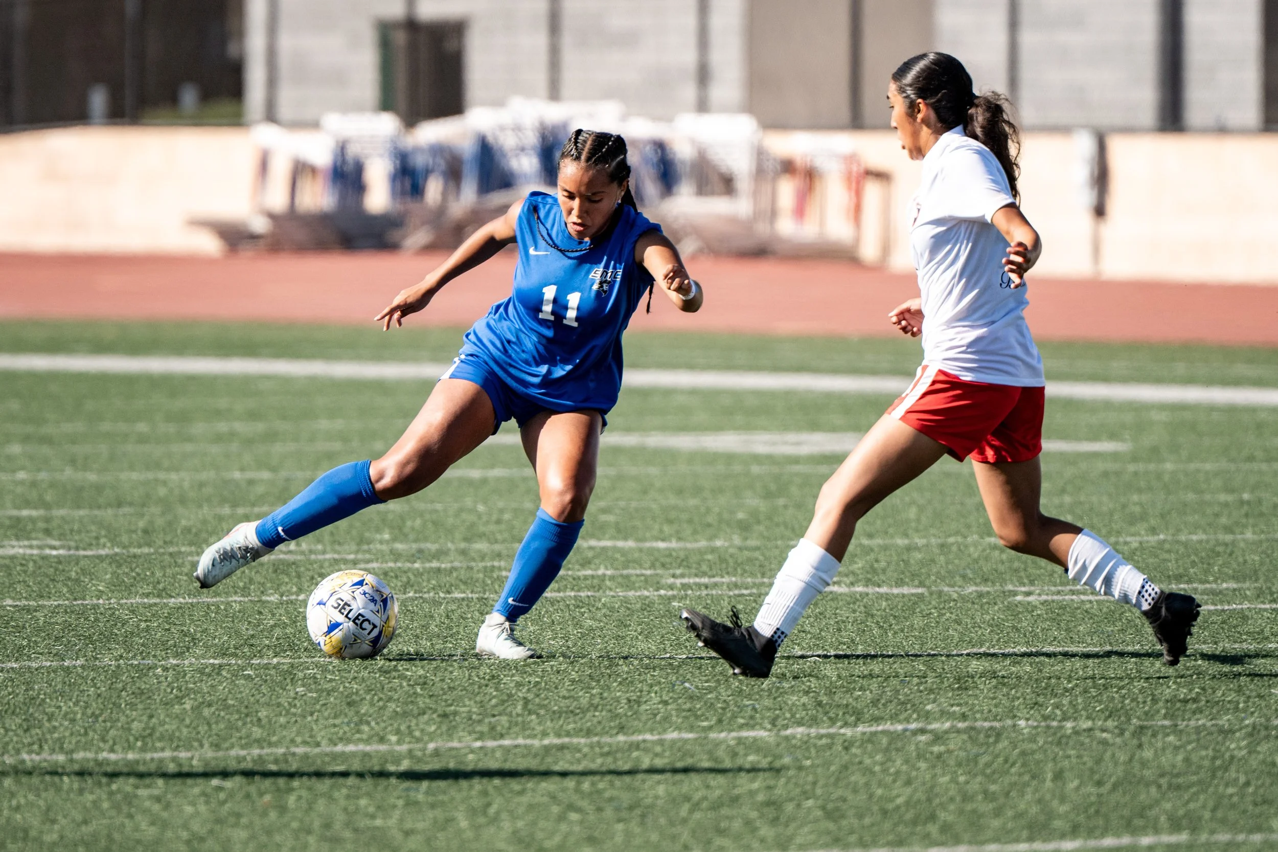Santa Monica College (SMC) Corsair forward (11) Erika Bautista driving passed LA Pierce College defender on Tuesday, September 9, 2025, In Santa Monica,Calif. The Corsairs won 1-0. (Tom Rosholt | The Corsair)