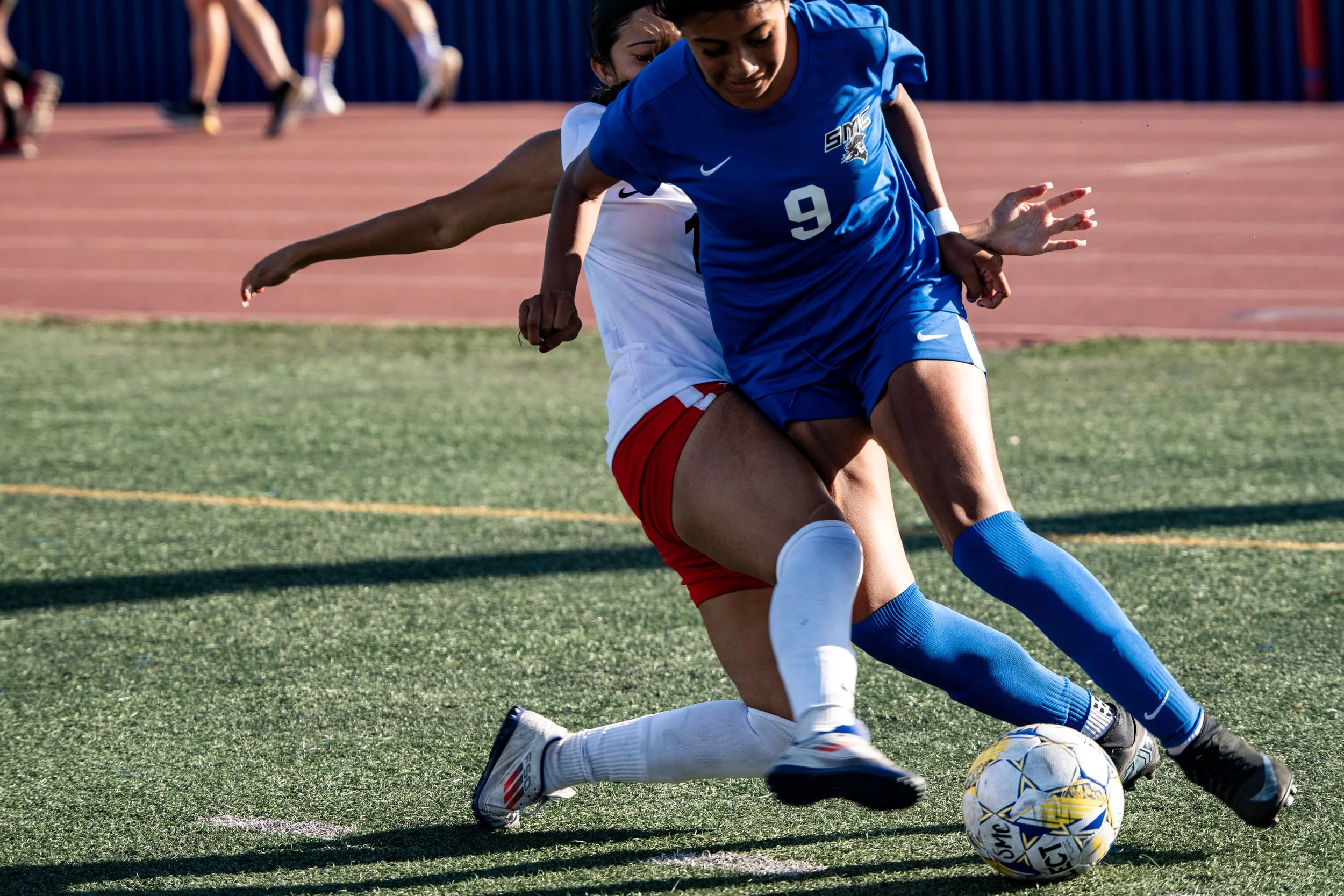 Santa Monica College (SMC) Corsair defender (9) Marlene Garcia being checked by LA Pierce College Brahma (9) Bianca Lemus on Tuesday, September 9, 2025, in Santa Monica,Calif. The Corsairs won 1-0. (Tom Rosholt | The Corsair)
