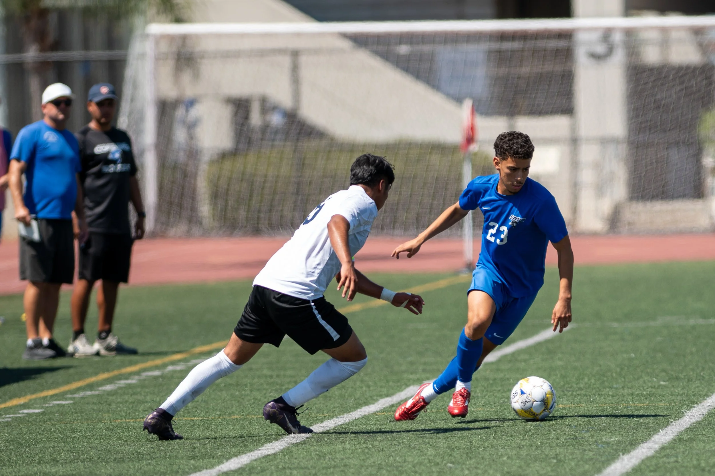 Santa Monica College (SMC) Corsair winger (23) Denver Ewing-Johnson moving passed Fullerton College Hornet (10) Jacob Leggette on Tuesday, September 9, 2025, in Santa Monica,Calif. The Corsairs tide with the Hornets 4-4.(Tom Rosholt | The Corsair)