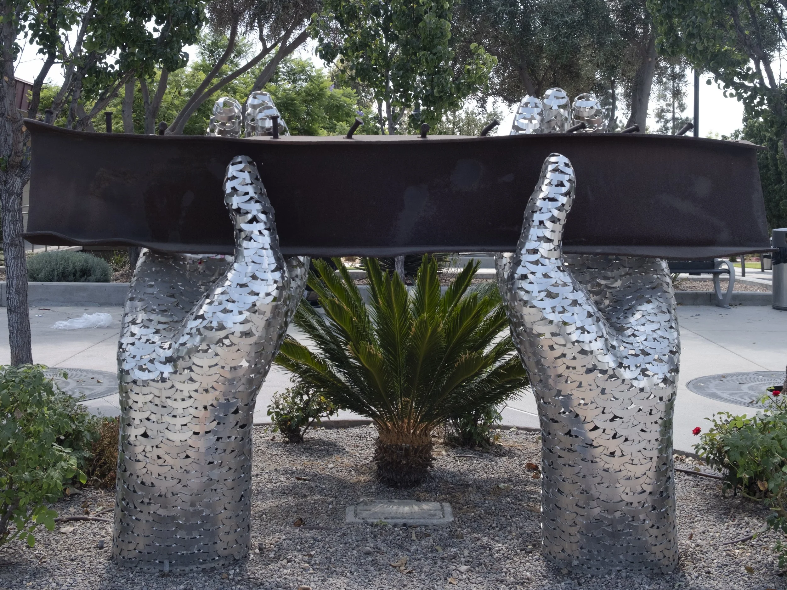9/11 Memorial at City Hall Civic Plaza, Rosemead, Calif. on Wednesday, Sept 10, 2025. The sculpture consists of two hands made up of reflective cutouts of thousands of dove-like shapes holding a steel beam from the World Trade Center. (Fai Fong