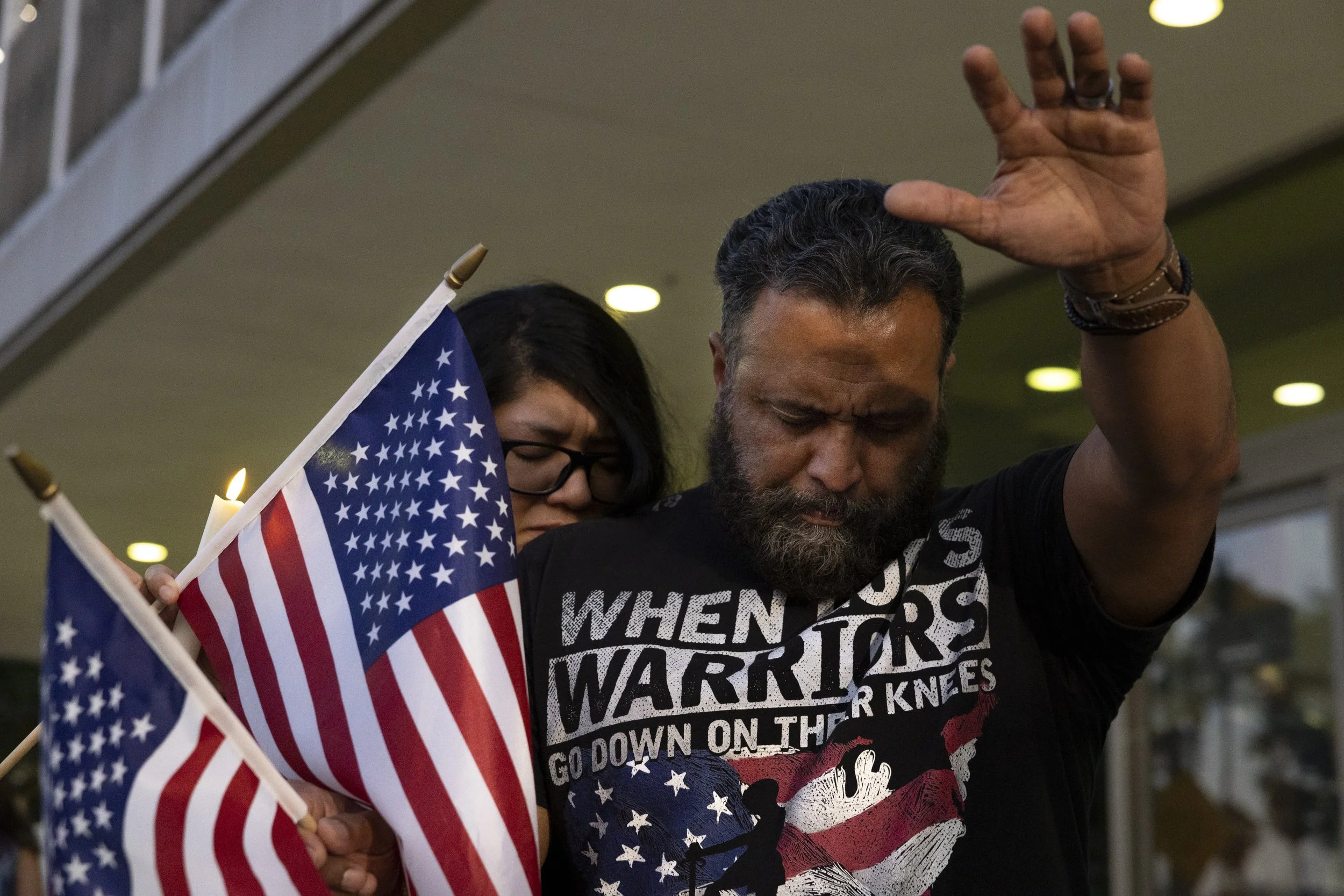 Mourners gather at a vigil held outside the Federal building in downtown Los Angeles on Thursday, Sept 11, 2025, after Charlie Kirk’s assassination.(Jake Crandall | The Corsair)