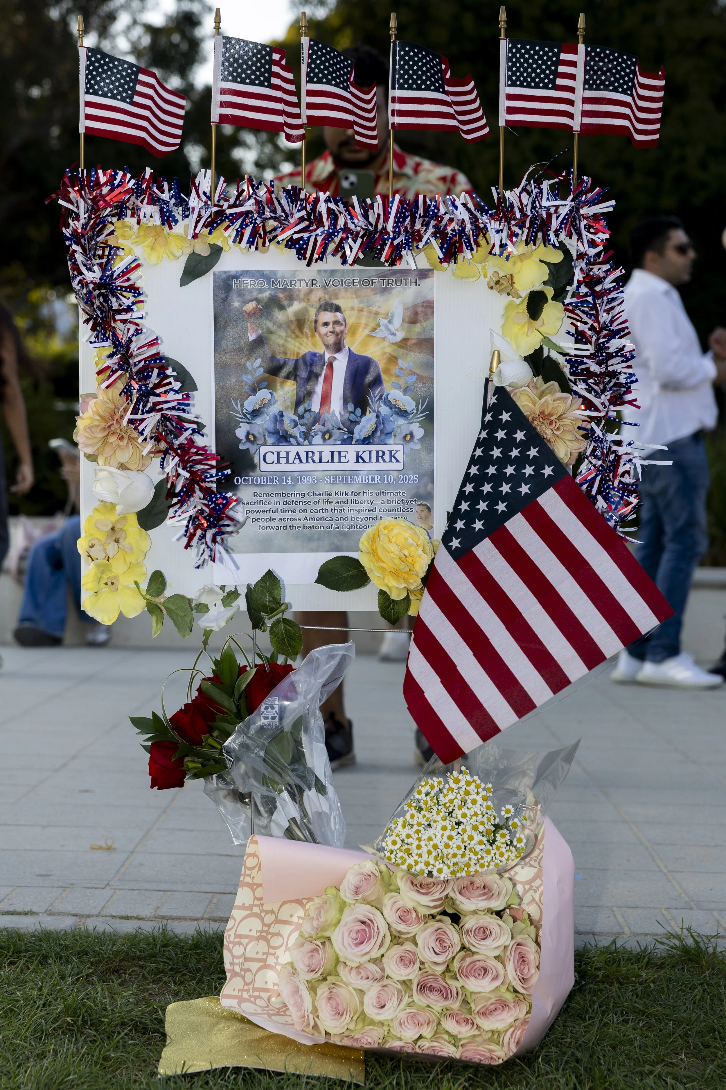 A vigil sign dedicated to Charlie Kirk is set during a vigil, on Sunday, Sept 14, 2025, in Beverly Hills, Calif., following Charlie Kirk’s assassination. (Jake Crandall | The Corsair)